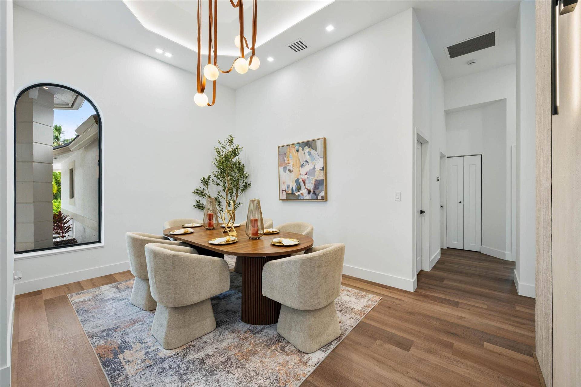 Unique lighting in dining area & throughout the home
