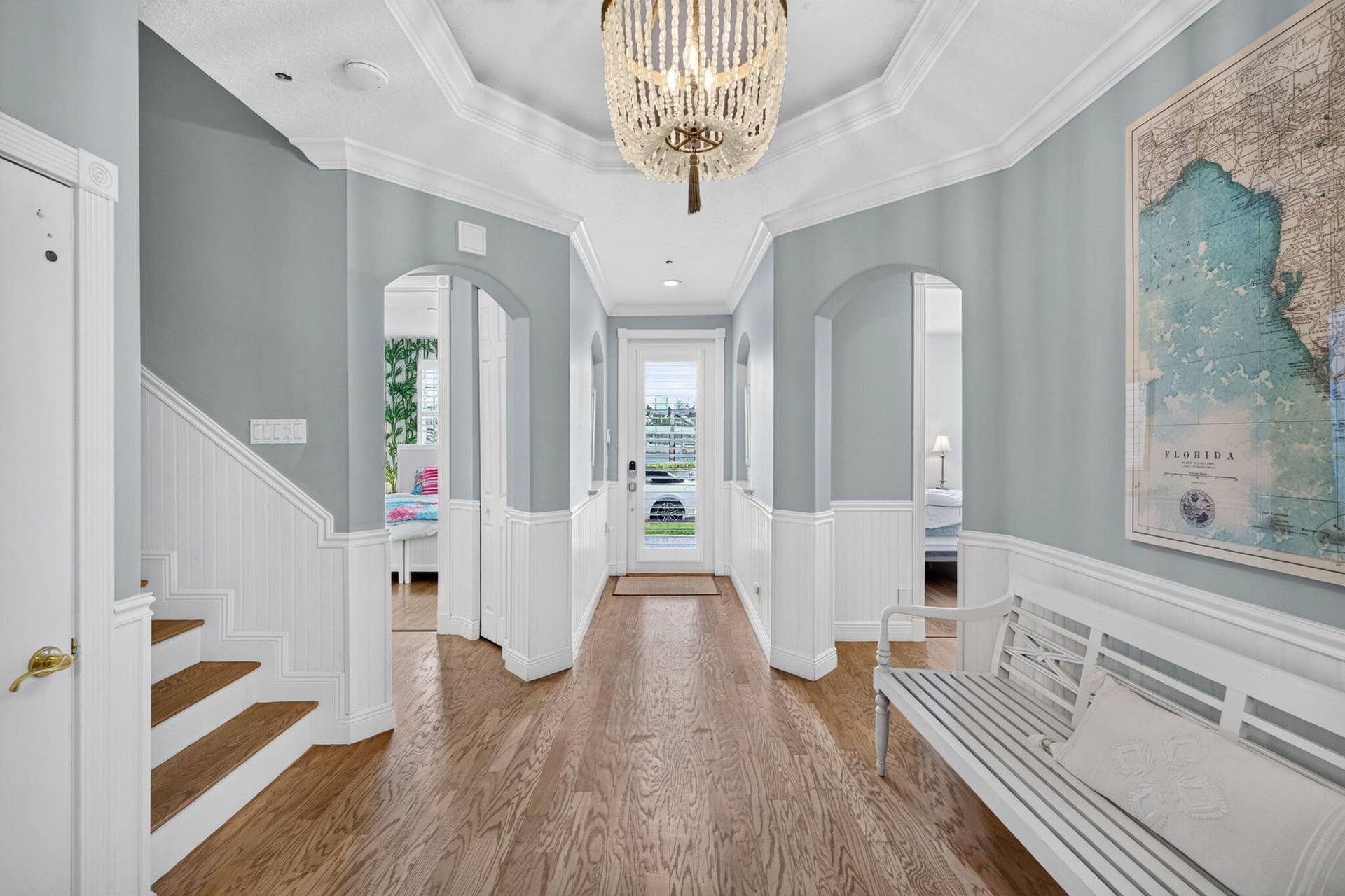 2814 Marina Circle, Lighthouse Point, FL 33064 Foyer with high ceilings and wainscoting