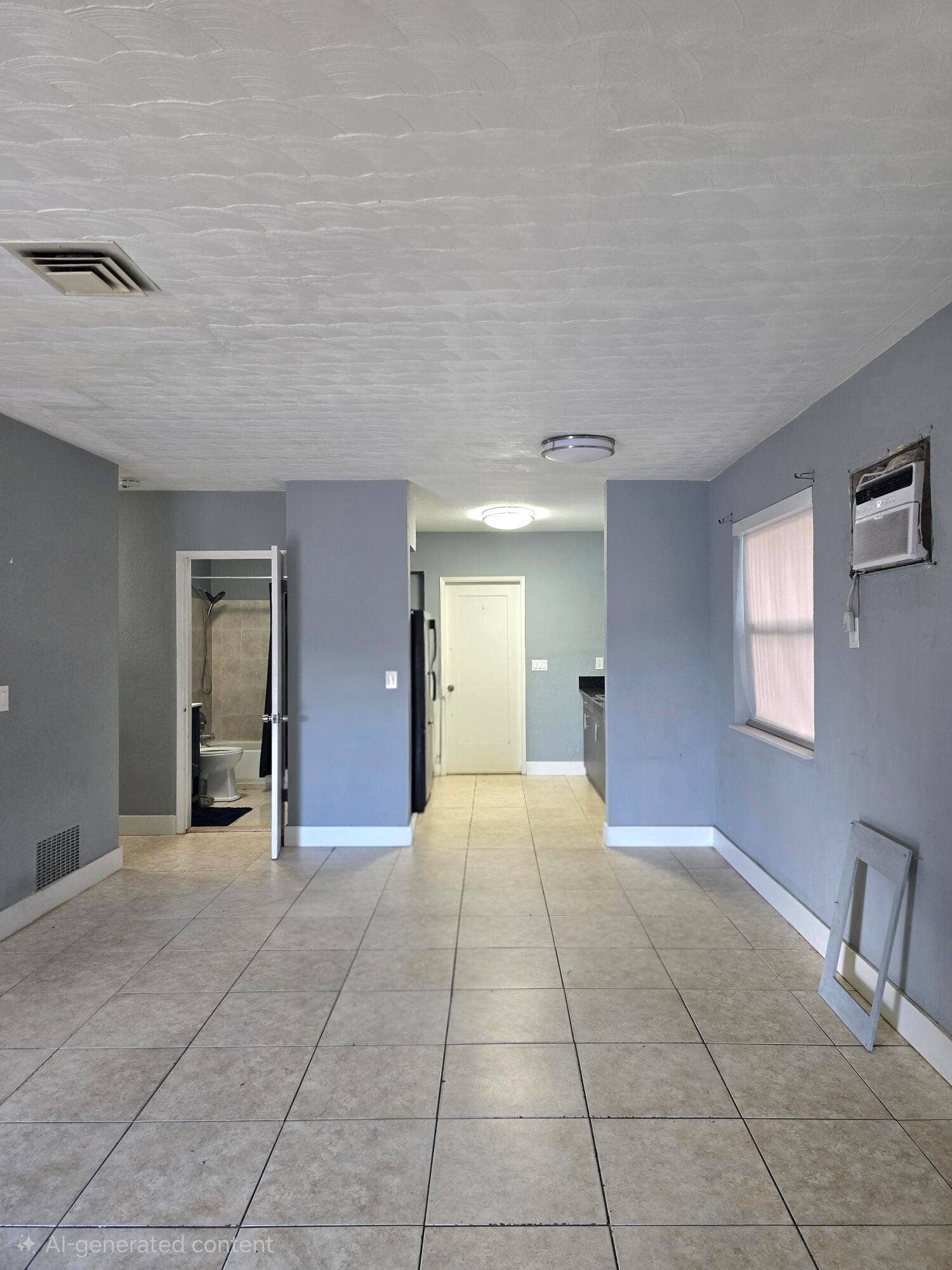305 SW 14TH Street, #1 FRONT, Dania Beach, FL 33004 LIVING ROOM LOOKING TOWARDS KITCHEN