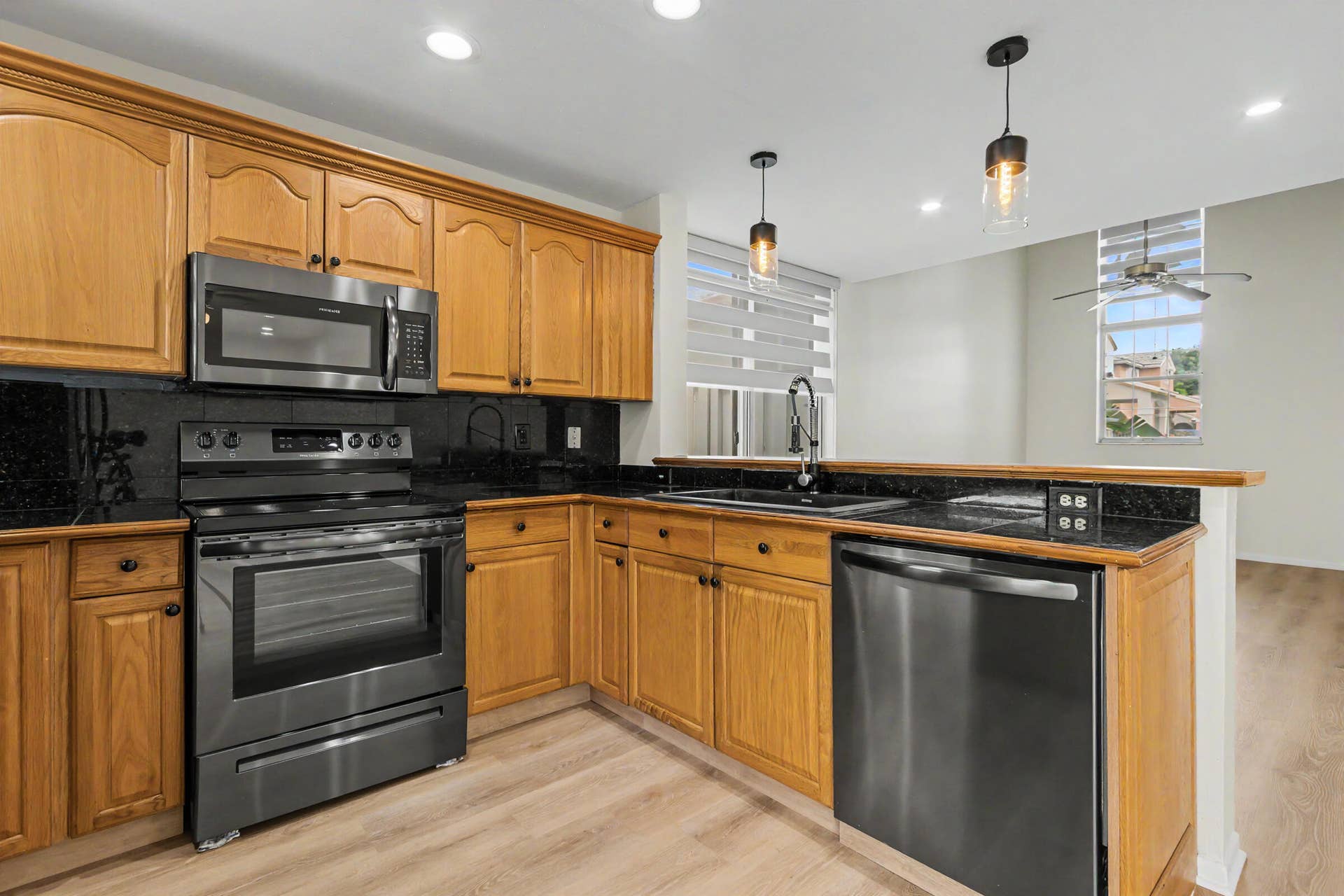 Kitchen with black stainless appliances