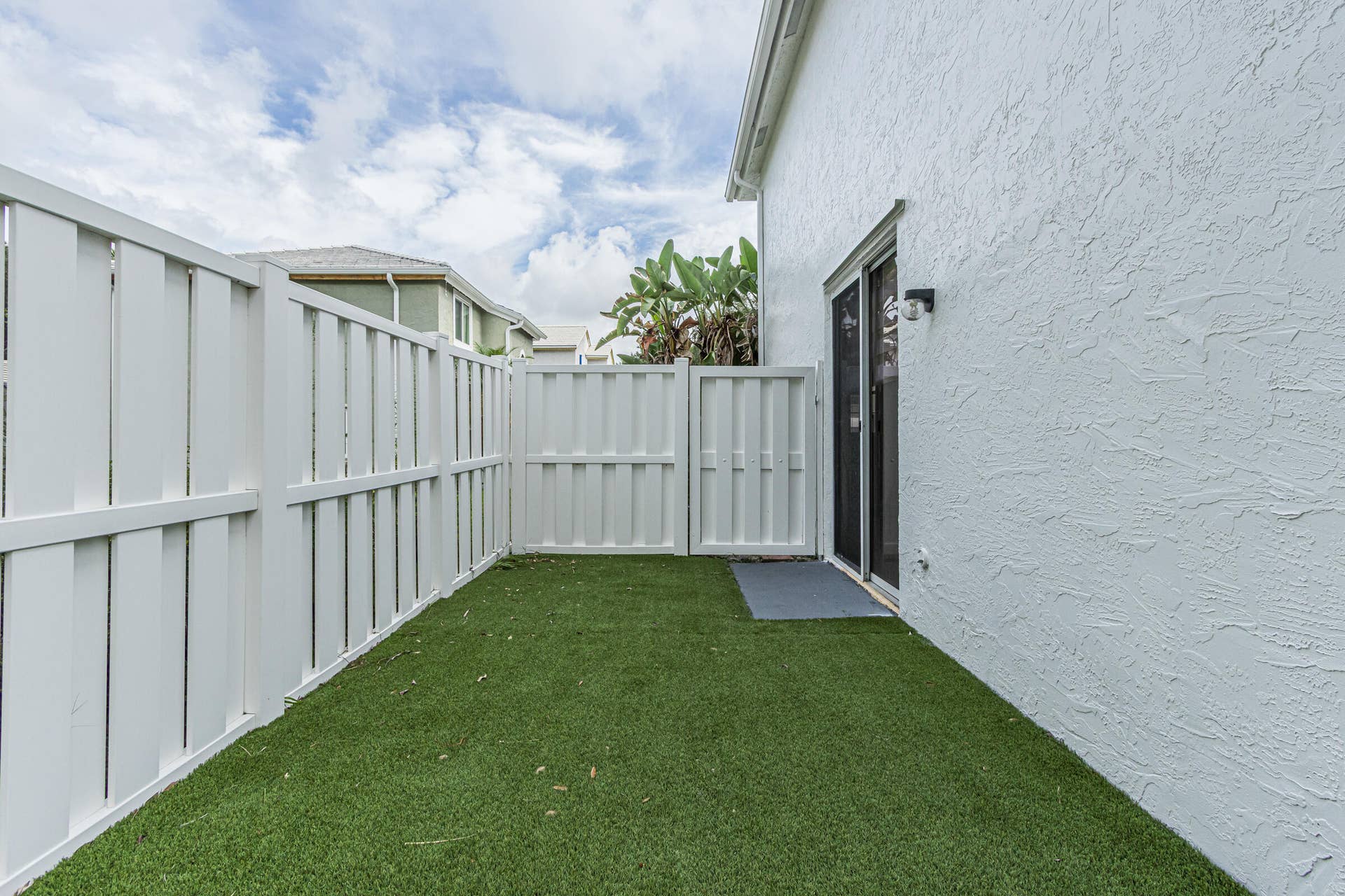 Side yard with turf lawn