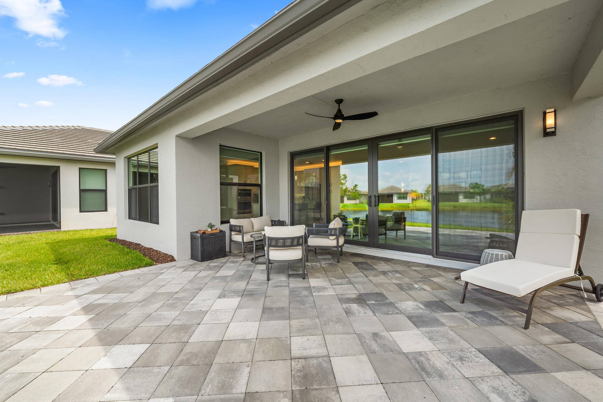 12454 SW Alongshore Drive, Port St Lucie, FL 34987 Extended Paver Patio with Lake View
