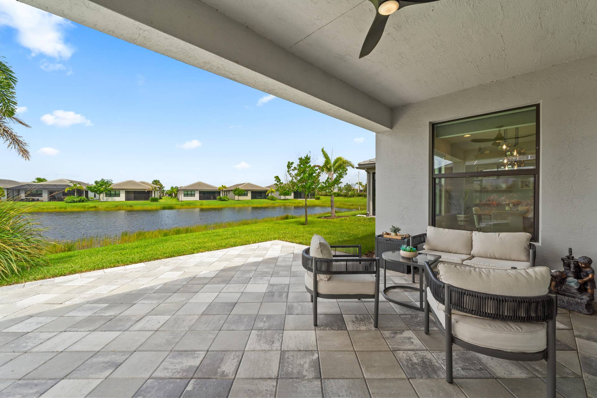 12454 SW Alongshore Drive, Port St Lucie, FL 34987 Extended Paver Patio with Lake View