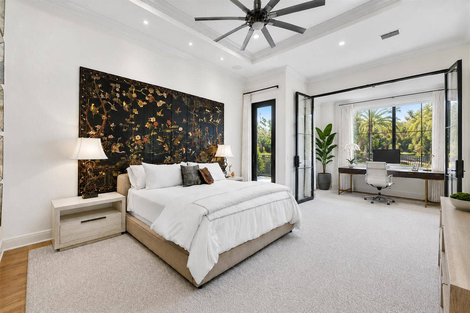 Primary bedroom with private access to the backyard (AS IS). Glass doors