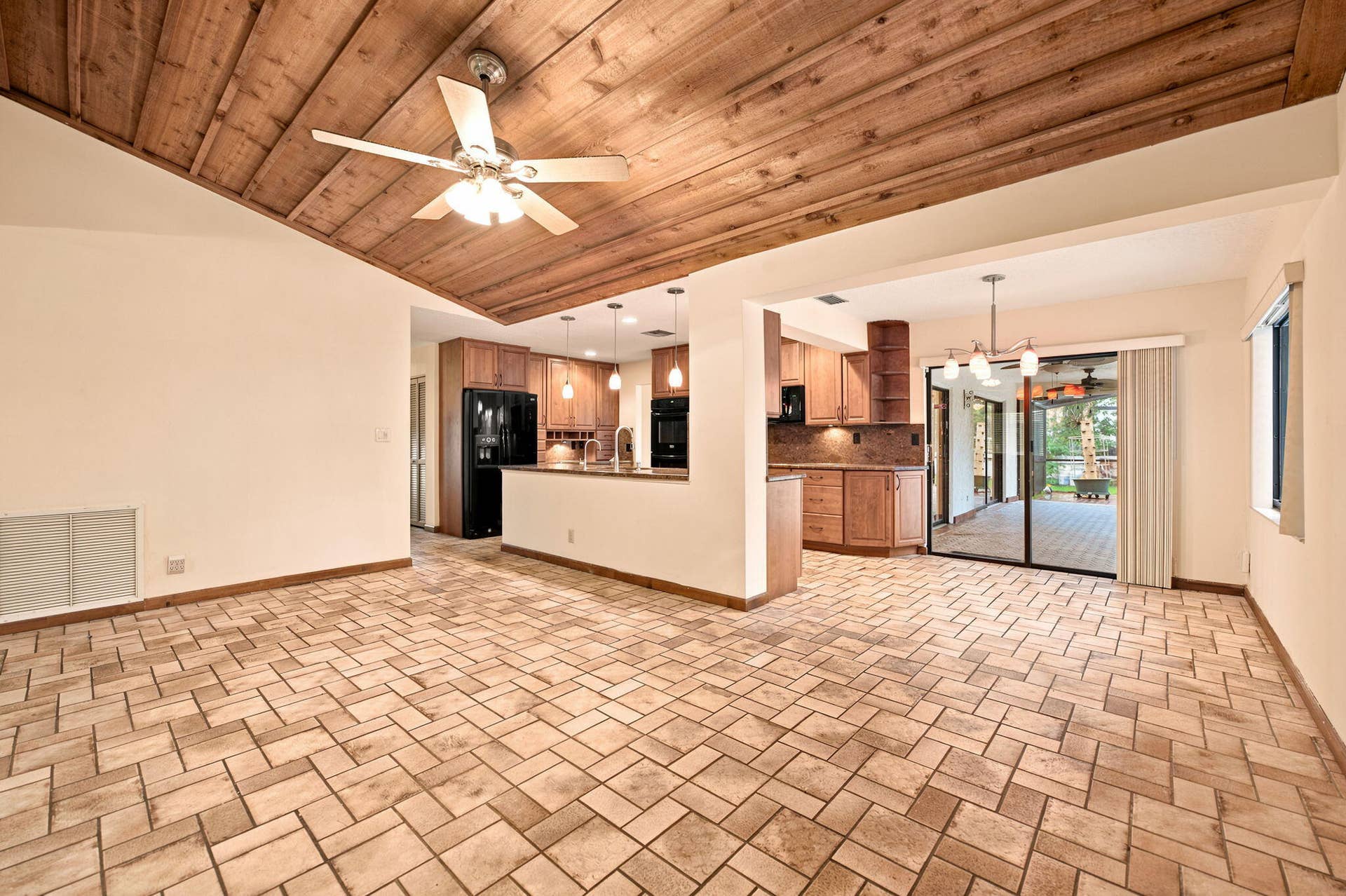 KITCHEN OPEN TO FAMILY ROOM