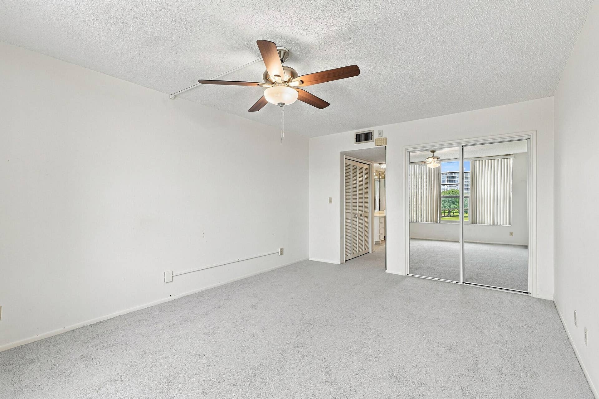 555 Oaks Lane, #303, Pompano Beach, FL 33069 28_primary bedroom