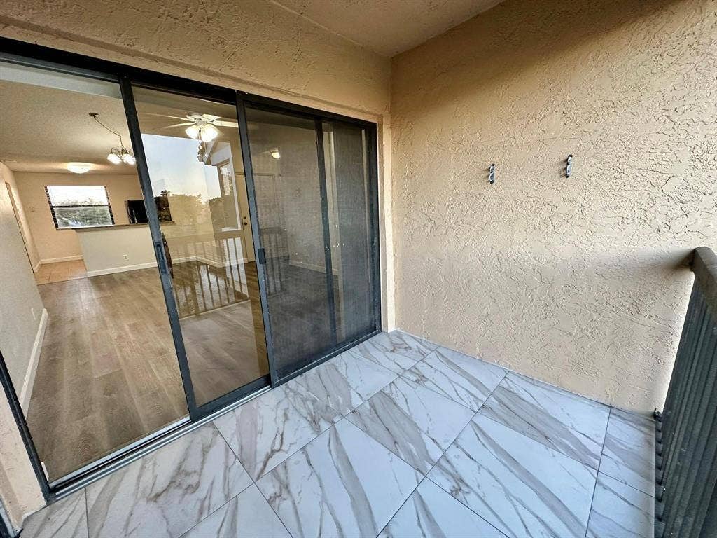 5641 RIVERSIDE Drive, #306B1, Coral Springs, FL 33067 Tiled Balcony