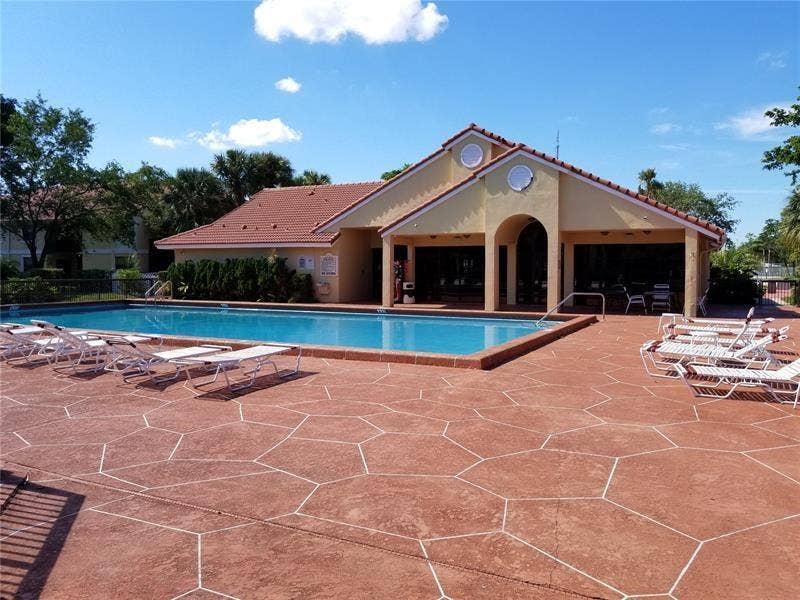 5641 RIVERSIDE Drive, #306B1, Coral Springs, FL 33067 Community Pool
