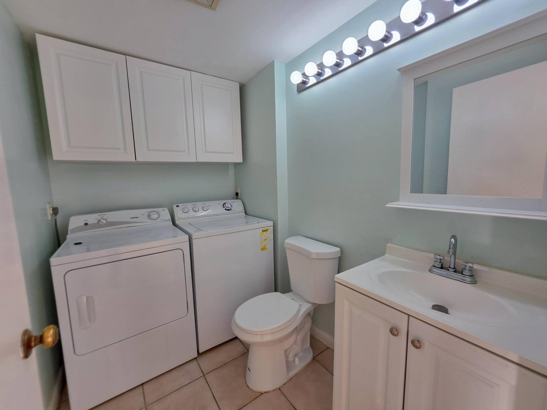 832 BLUE RIDGE Circle, West Palm Beach, West Palm Beach, FL 33409 half bathroom / laundry