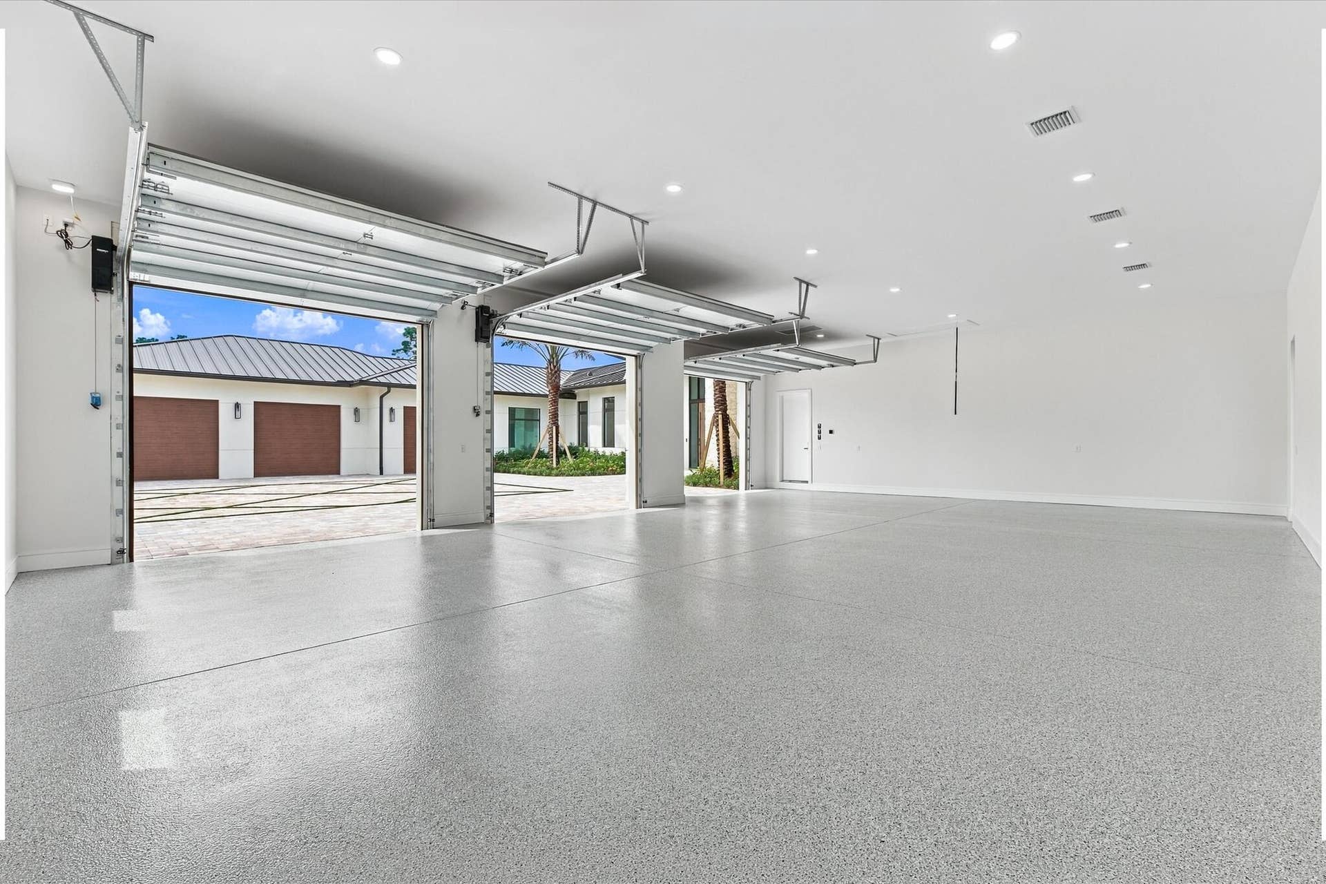 5593 Reynolds Road, Lake Worth, FL 33449 Garage doors open