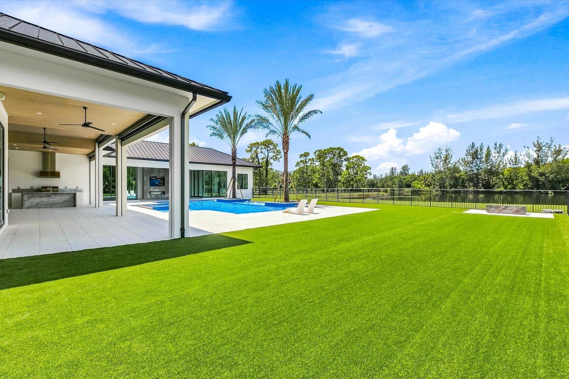 5593 Reynolds Road, Lake Worth, FL 33449 Turf around pool deck
