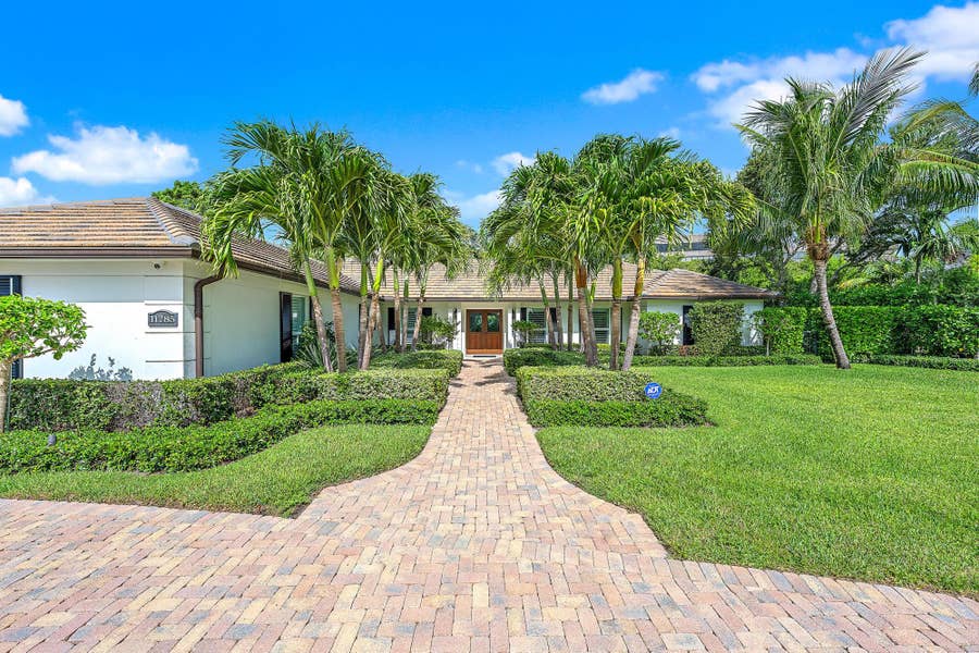 Property photo for 11785 Lake Shore Place, North Palm Beach, FL