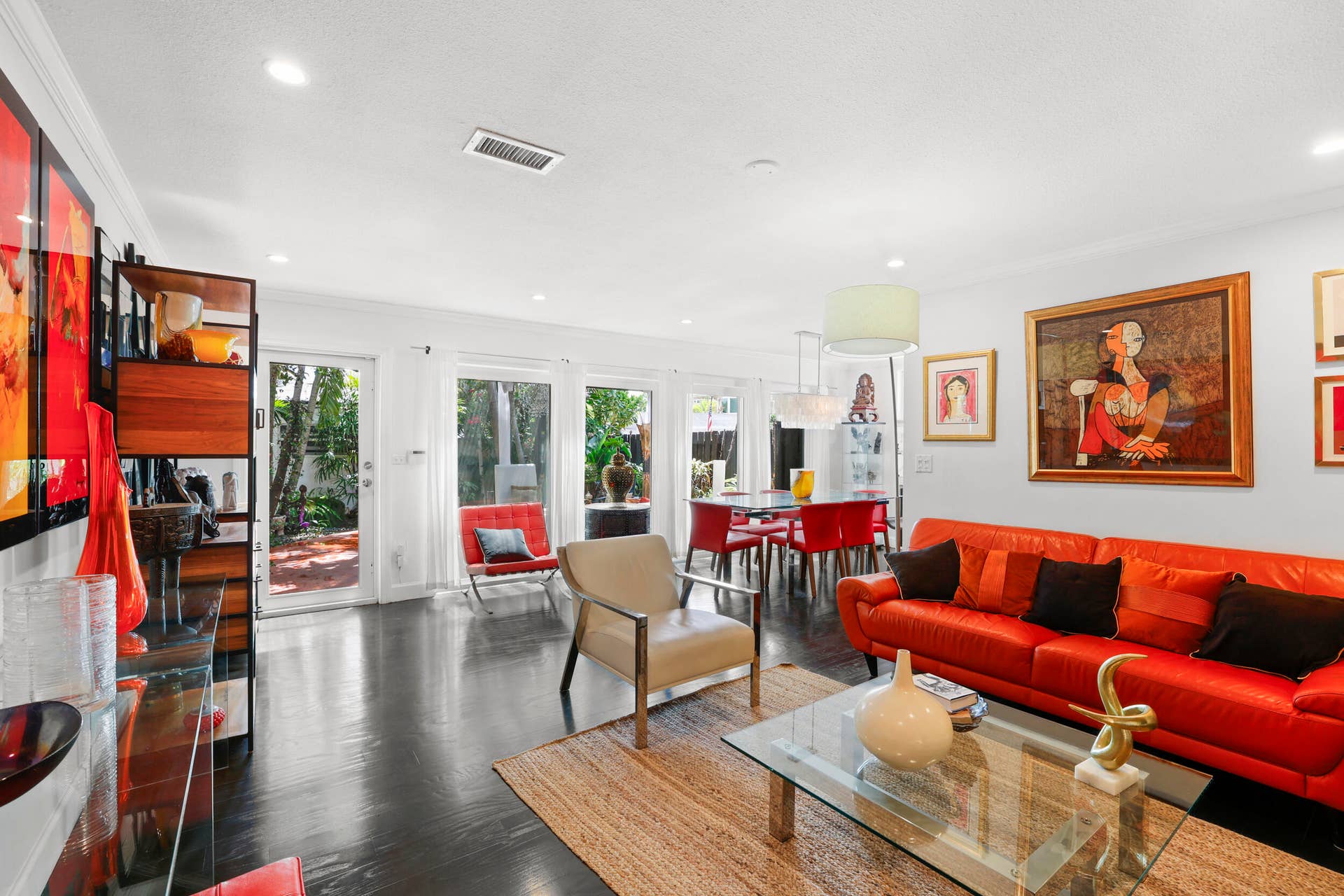 7 Middlesex Drive, Wilton Manors, FL 33305 Open-concept living space featuring dark wood-finish flooring, white walls, and recessed lighting