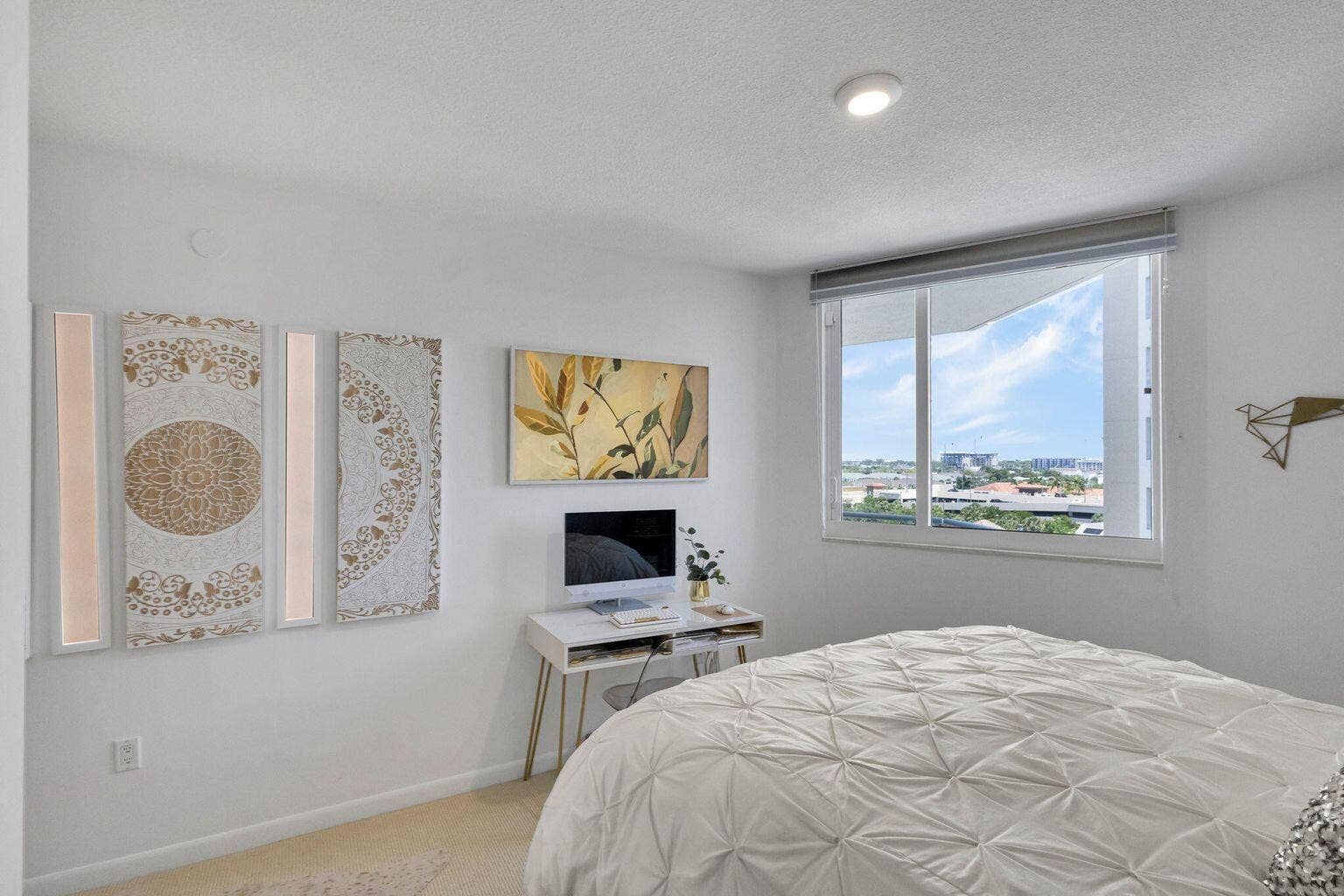 Bedroom featuring a large window, recessed lighting, and carpeted flooring