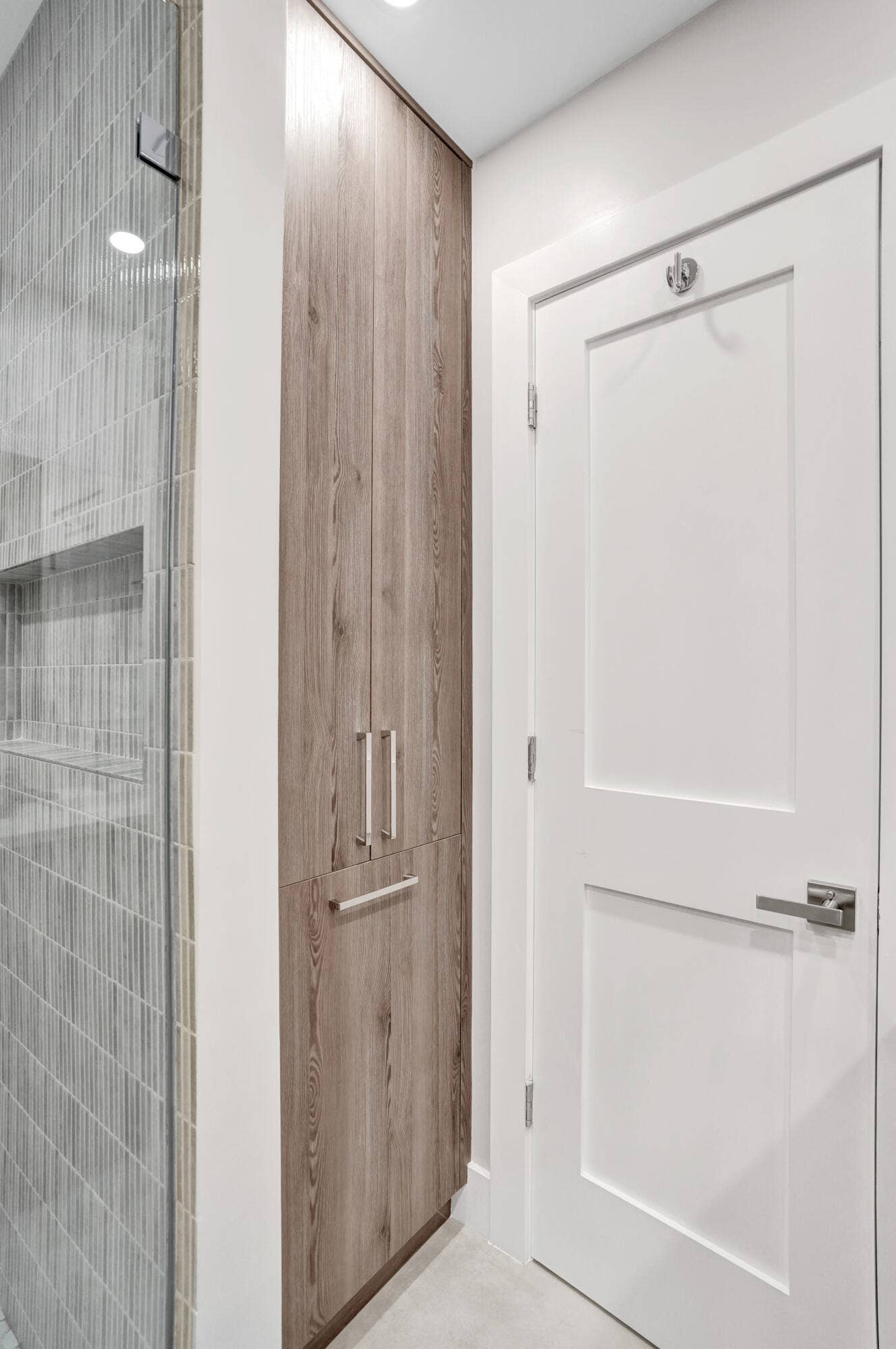 3608 NE 24TH Avenue, Fort Lauderdale, FL 33308 Custom pantry storage cabinet in hall bath with built in hamper