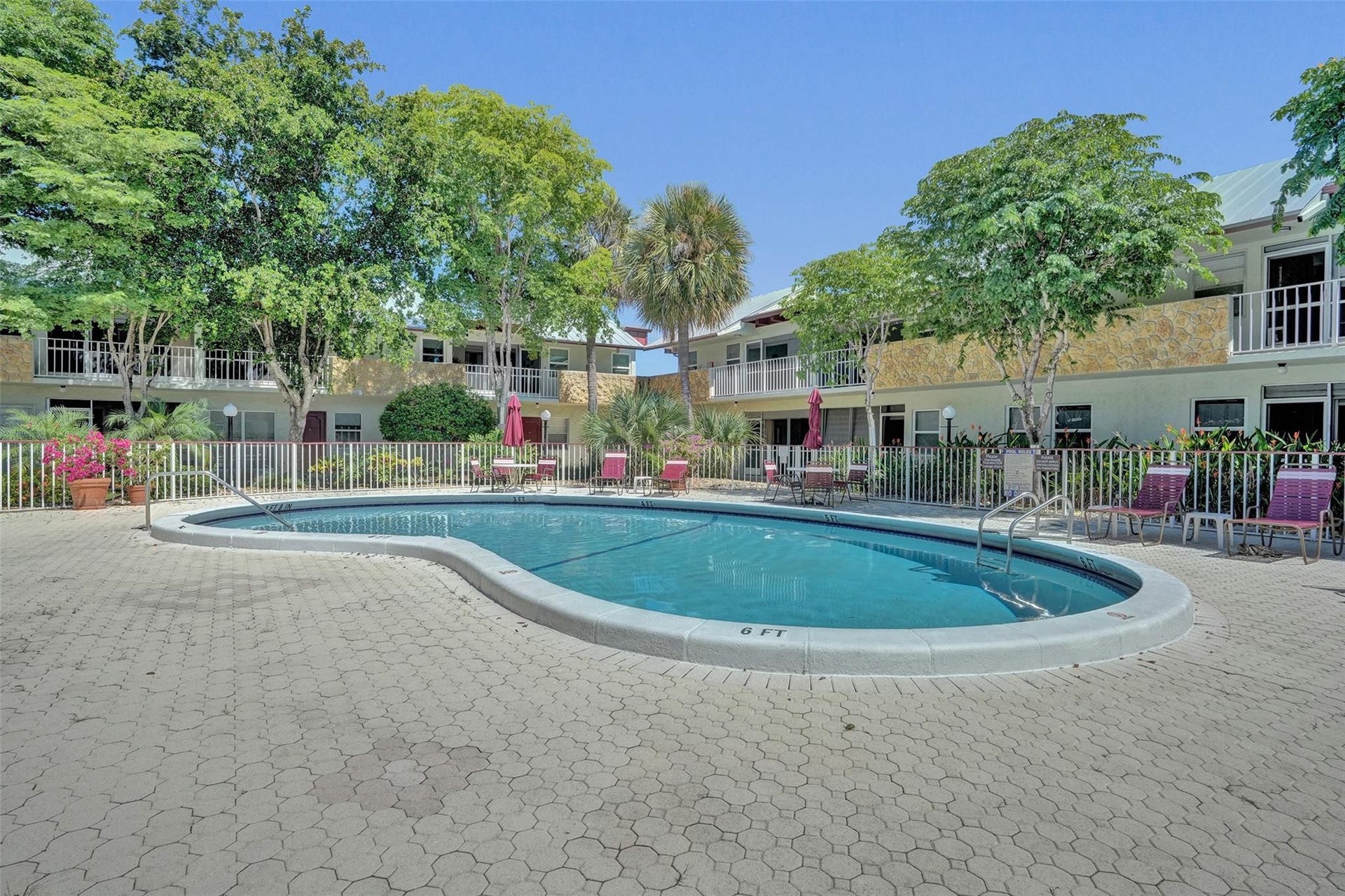 Renovated pool and sundeck with beautiful pavers.