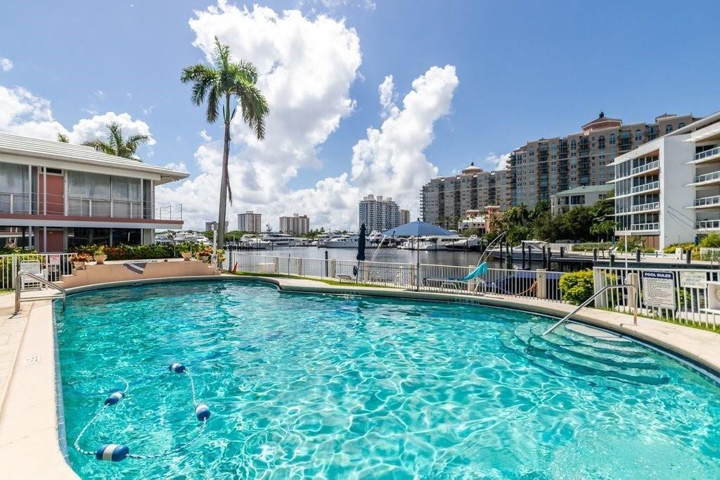 2760 YACHT CLUB Boulevard, #10C, Fort Lauderdale, Fort Lauderdale, FL 33304 Resort-style swimming pool with crystal-clear turquoise water, offering direct waterfront access