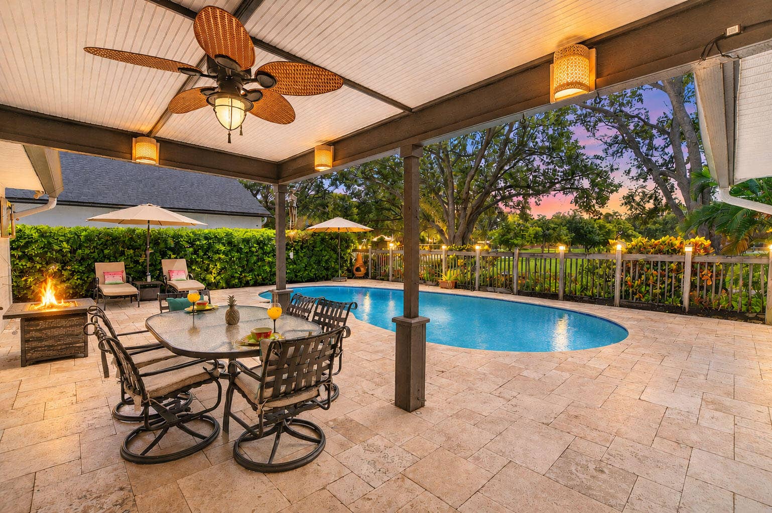 Covered patio has 2022 roof. Ready for guests to enjoy the eastern breezes.