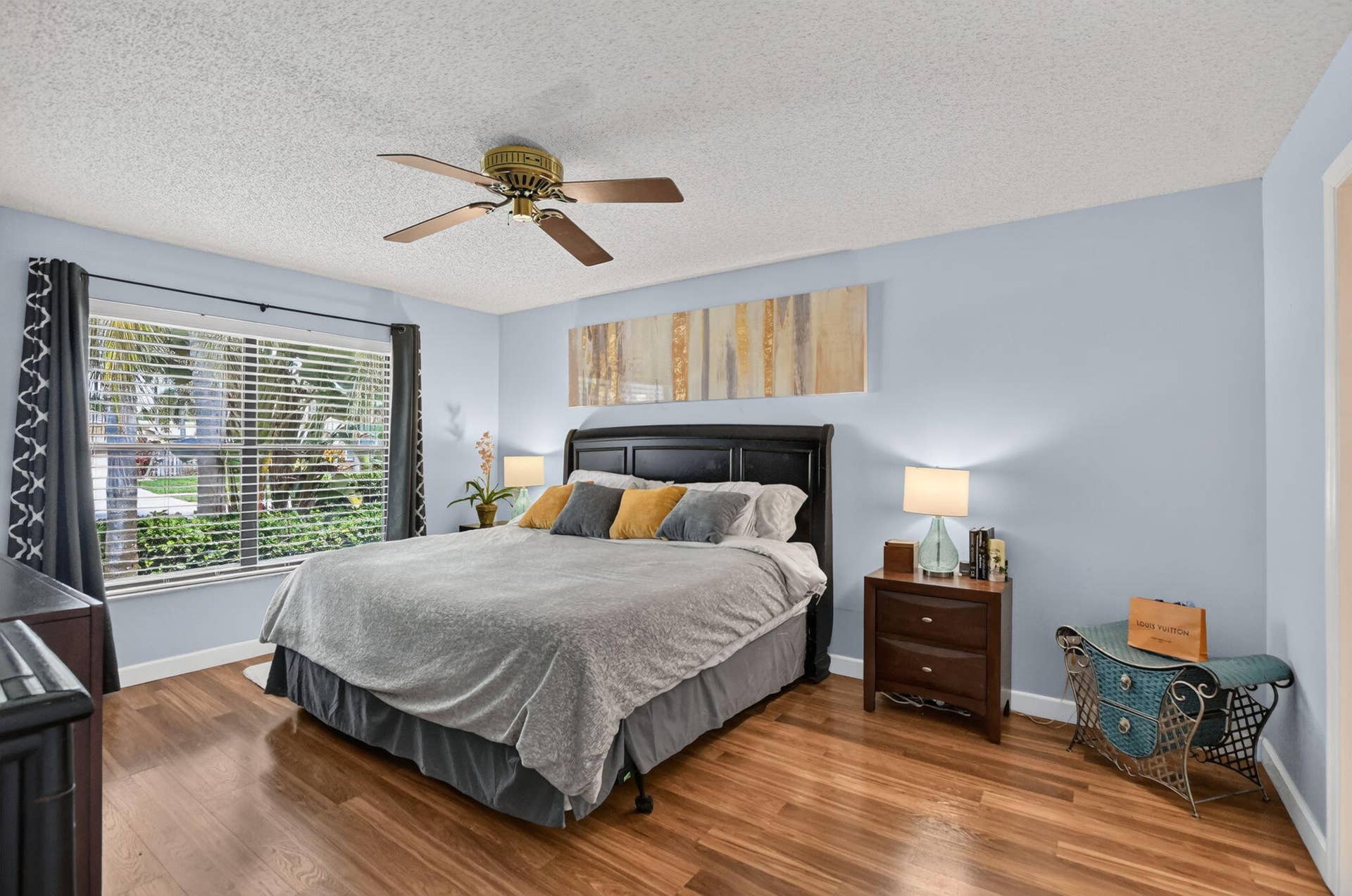 Fall in love in your primary bedroom with beautiful engineered hardwood floors.