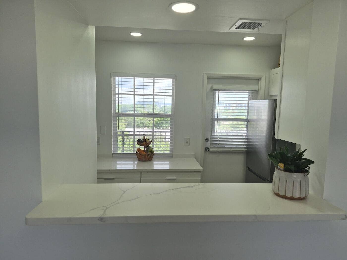 3050 N PALM AIRE Drive, #702, Pompano Beach, FL 33069 into kitchen