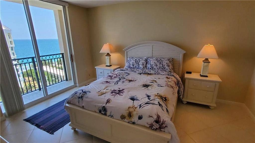 2001 N OCEAN Boulevard, #1106, Fort Lauderdale, FL 33305 Bedroom with a balcony ...