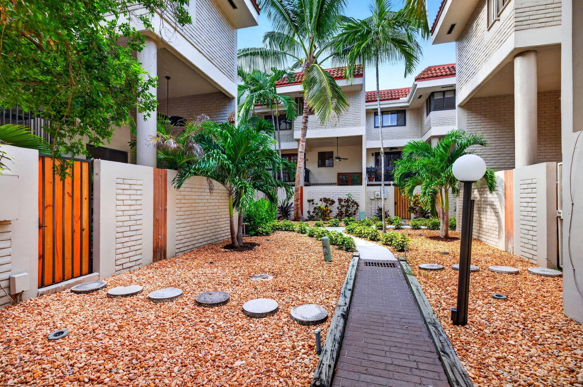 Back Patio with access to the community pool