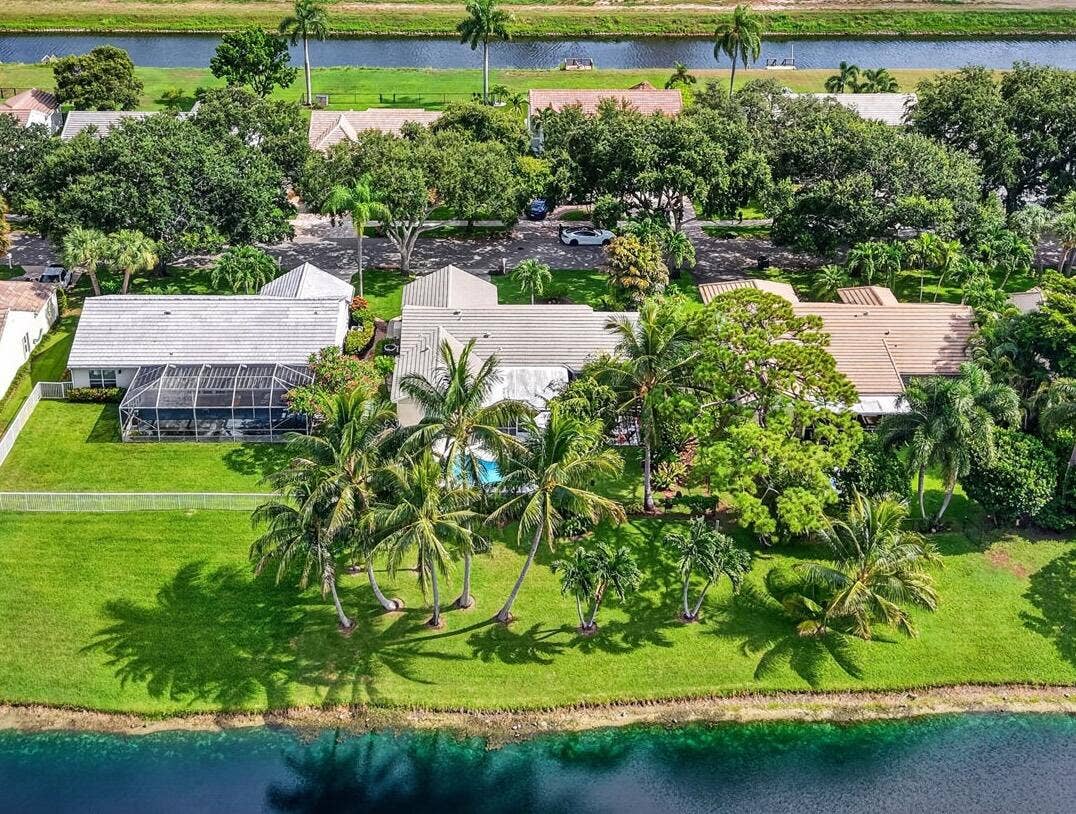 3864 Satin Leaf Court, Delray Beach, FL 33445 Lakefront with Tropical Landscaping