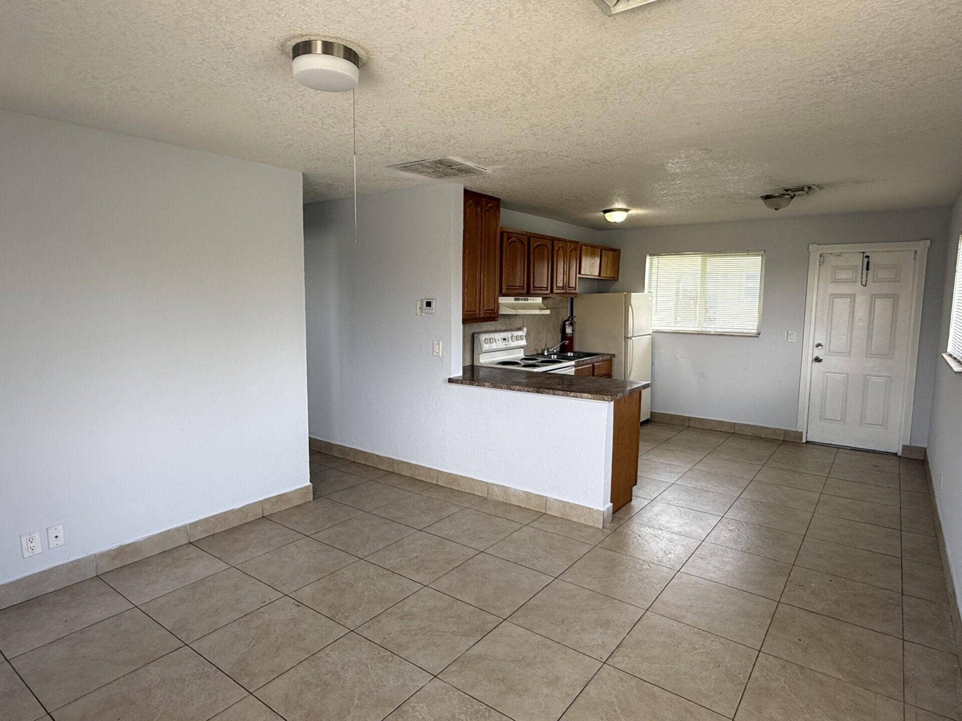 2820 Avenue S, #8, Riviera Beach, FL 33404 Kitchen and Living Room