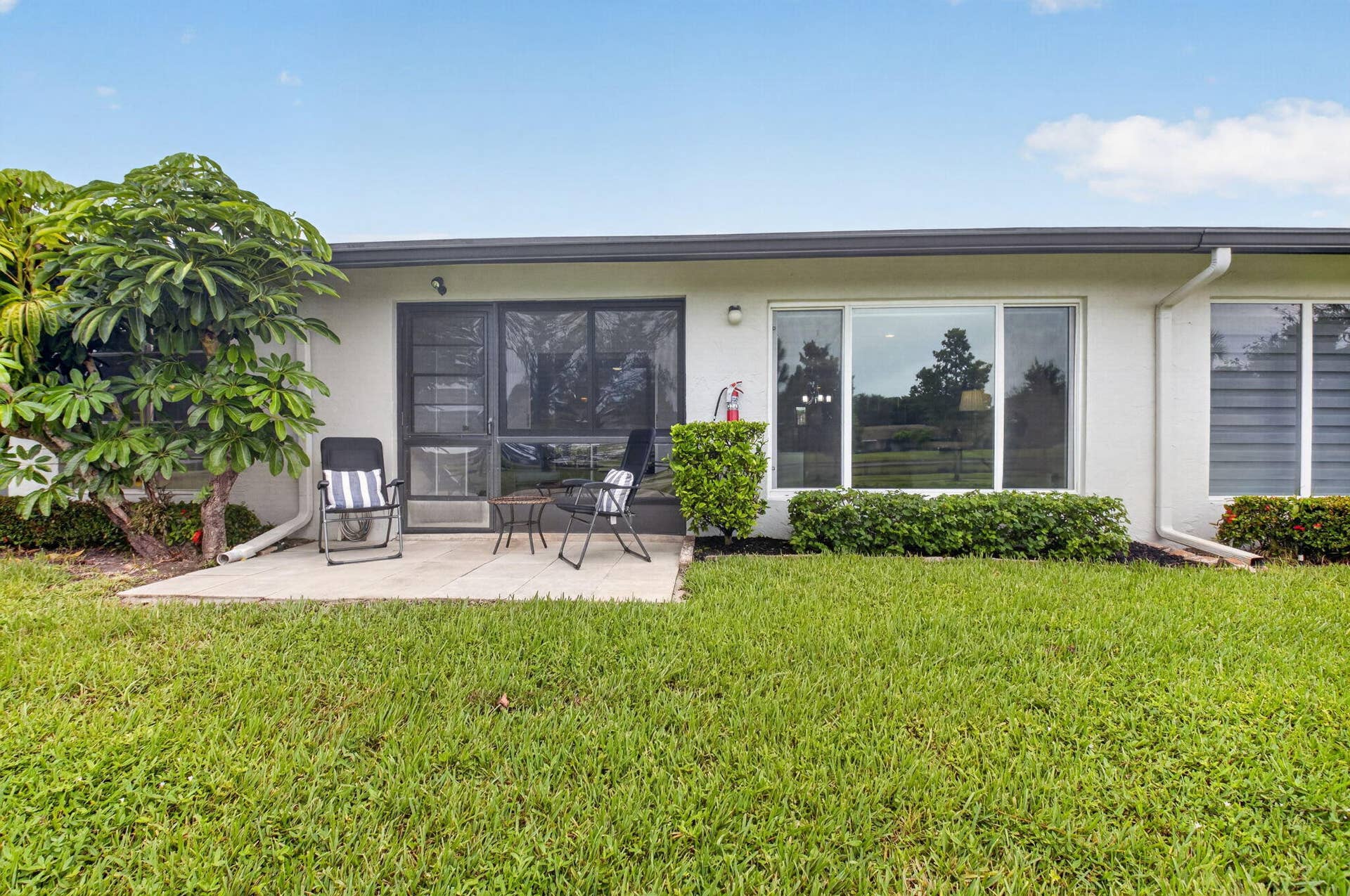 5810 ARECA PALM, #B, Delray Beach, FL 33484 REAR ELEVATION & OUTDOOR PATIO