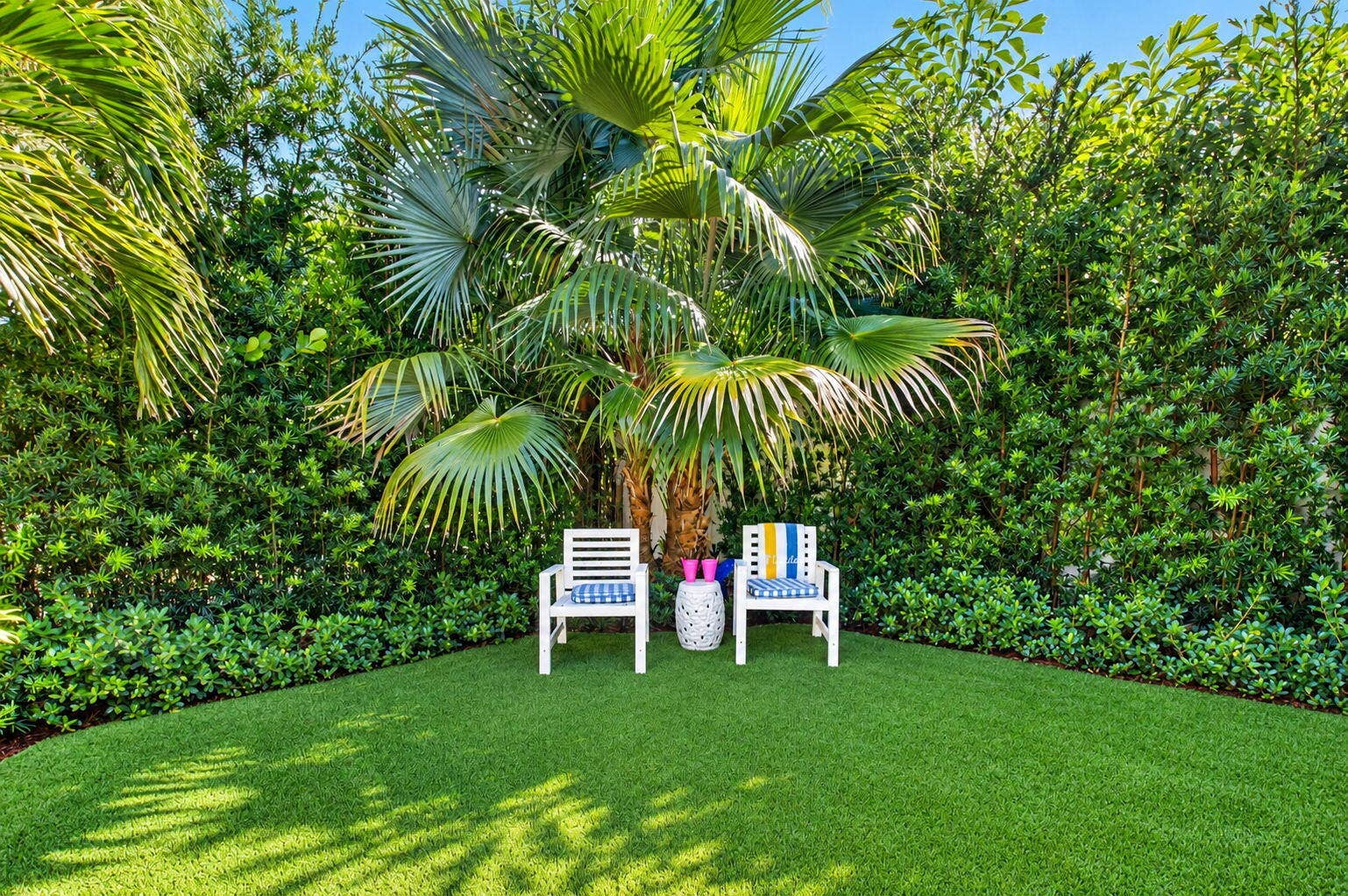 VERY TRANQUIL AND SHADED YARD HAS MAINTENANCE FREE. TURF