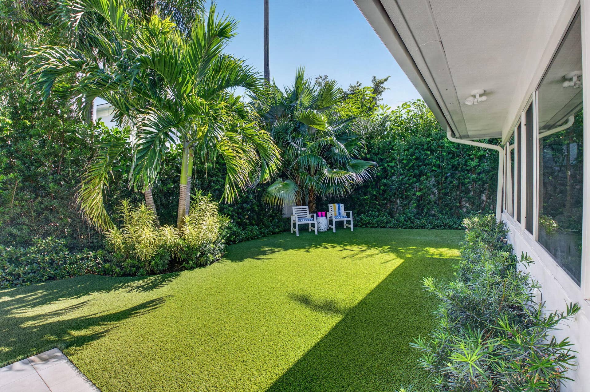MAINTENANCE FREE TURF IN REAR YARD AND ON BOTH SIDE ELEVATIONS