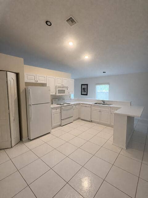 Kitchen with Bar top area
