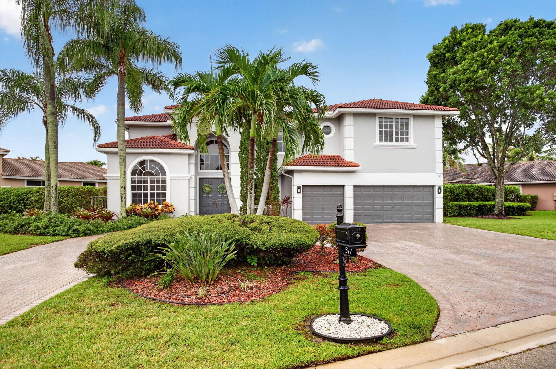 577 NW 120TH Drive, Coral Springs, FL 33071 Oversized circular driveway with three car garage