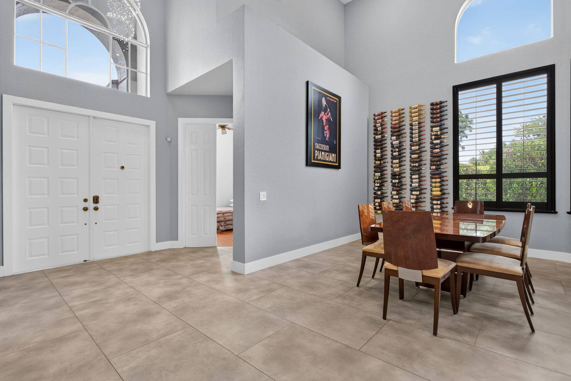 577 NW 120TH Drive, Coral Springs, FL 33071 Expansive entry with volume ceilings accessing dining room and living room