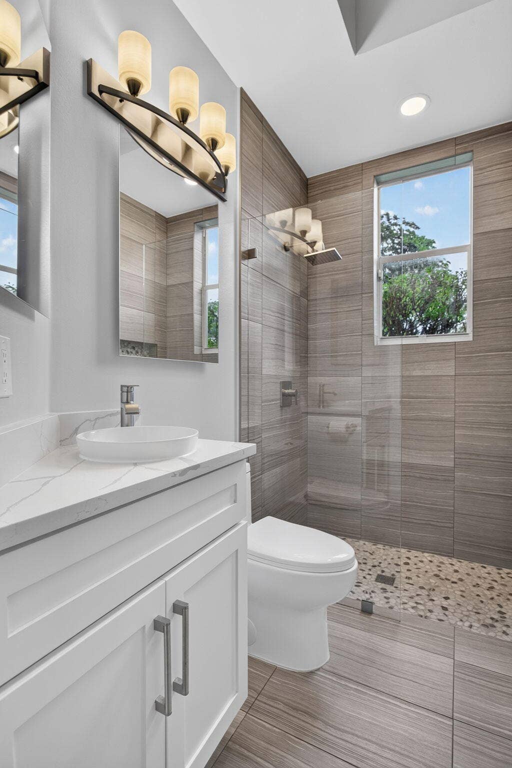 577 NW 120TH Drive, Coral Springs, FL 33071 Renovated fourth bathroom
