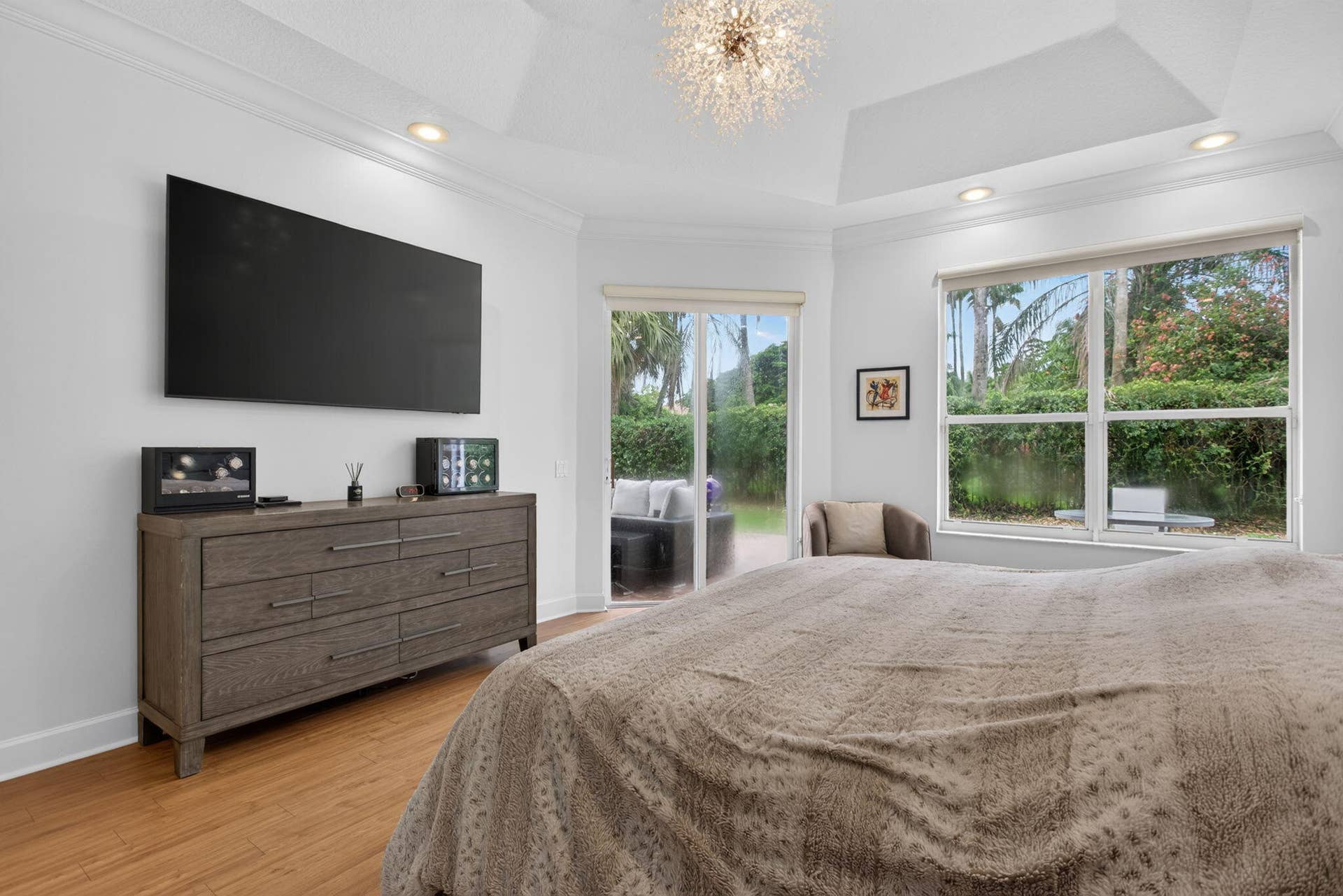 577 NW 120TH Drive, Coral Springs, FL 33071 Spacious primary bathroom with two large walk-in closets and access to fenced in yard