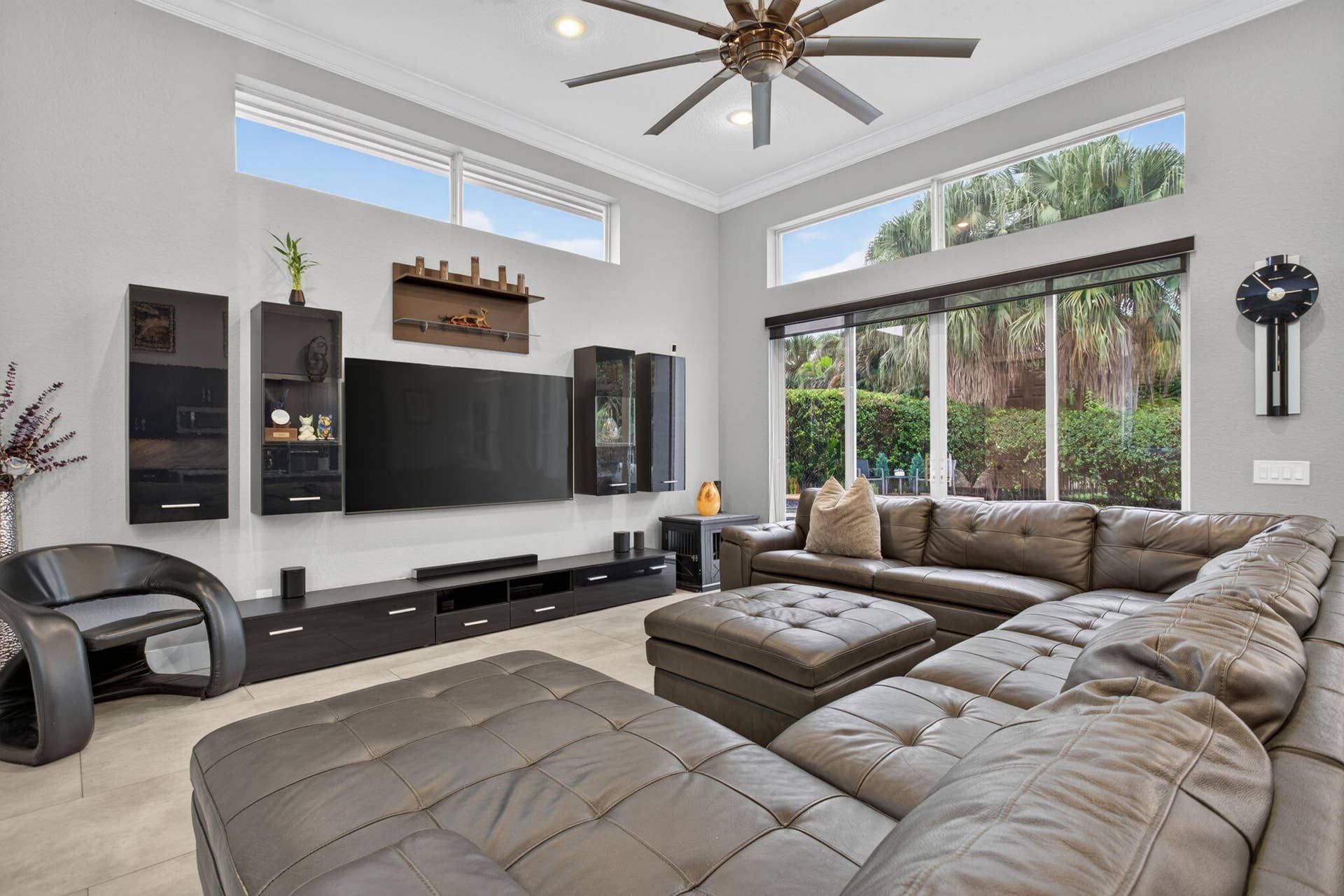 577 NW 120TH Drive, Coral Springs, FL 33071 Exceptional great room with blue river quartzite wood cabinetry and stainless steel appliances