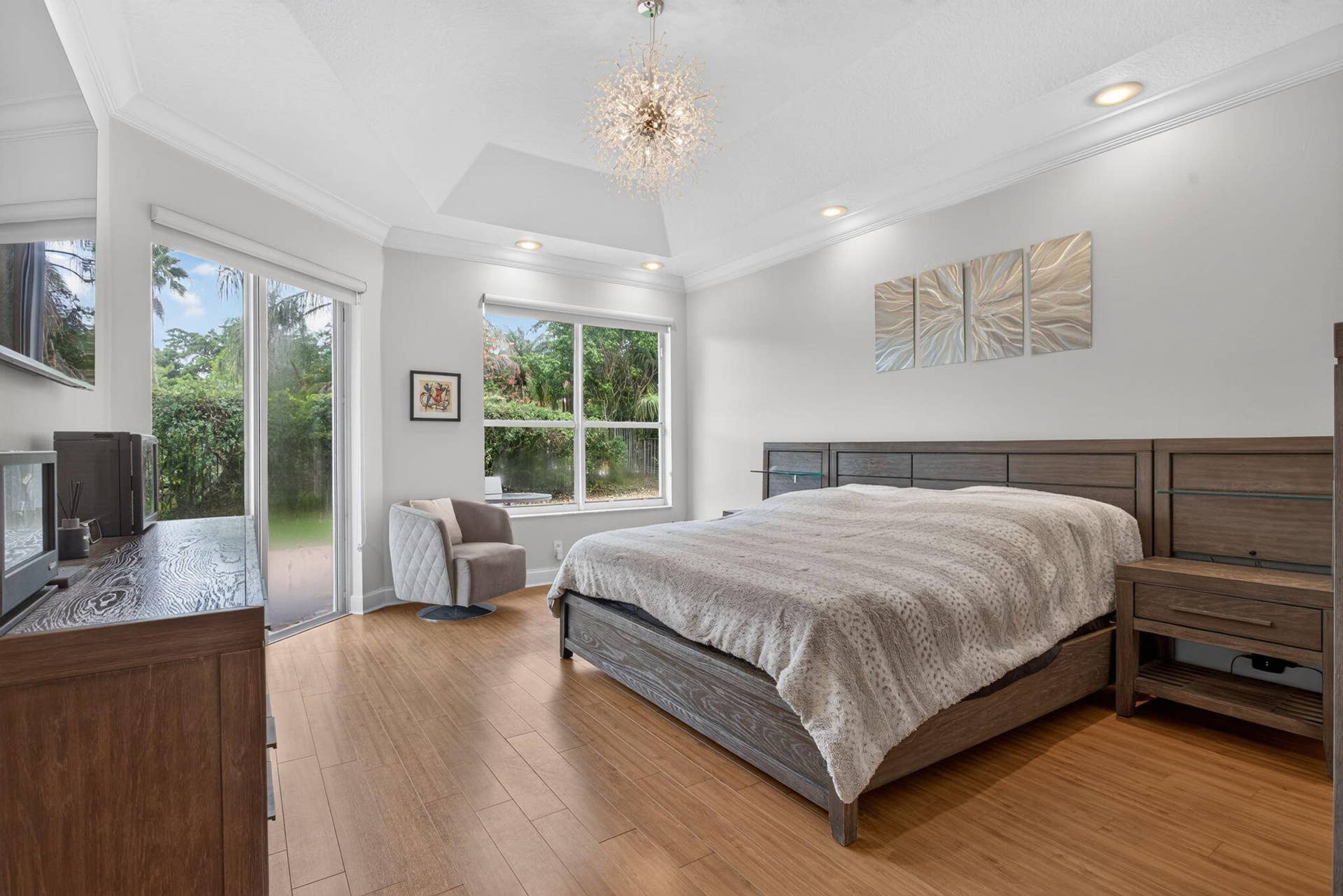 577 NW 120TH Drive, Coral Springs, FL 33071 Spacious primary bathroom with two large walk-in closets and access to fenced in yard