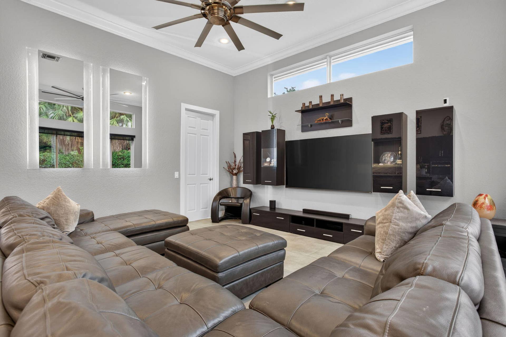 577 NW 120TH Drive, Coral Springs, FL 33071 Exceptional great room with blue river quartzite wood cabinetry and stainless steel appliances
