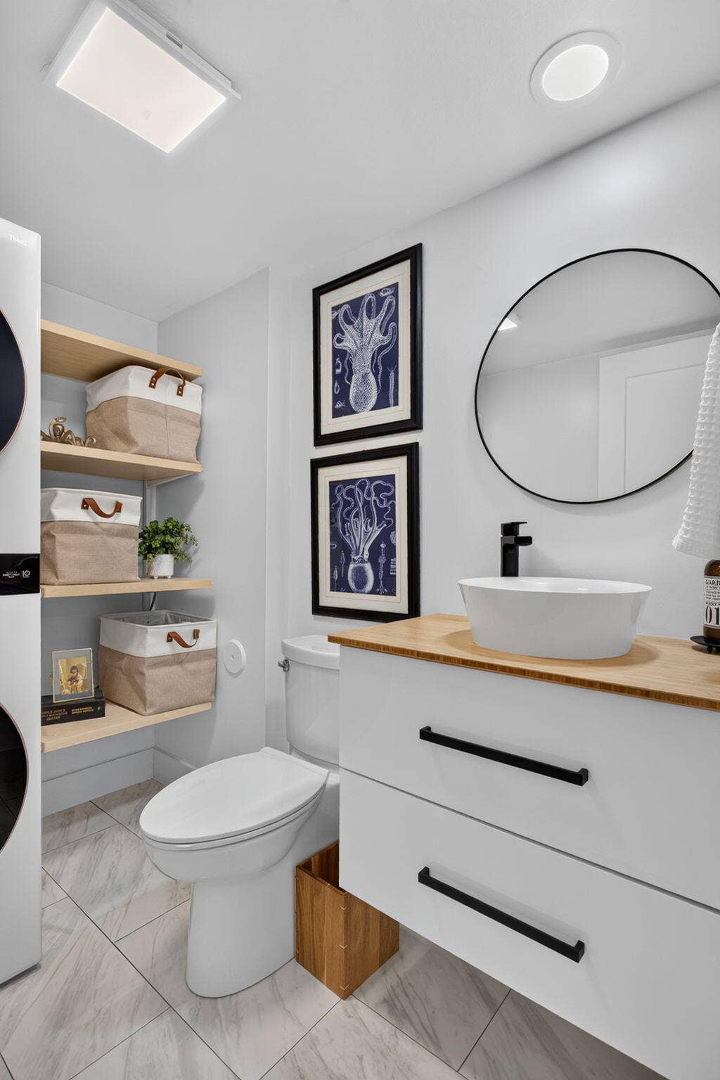 9113 SW 20th Court, #A, Davie, FL 33324 Modern vanity with a white vessel sink, wood-finish countertop, and matte black faucet