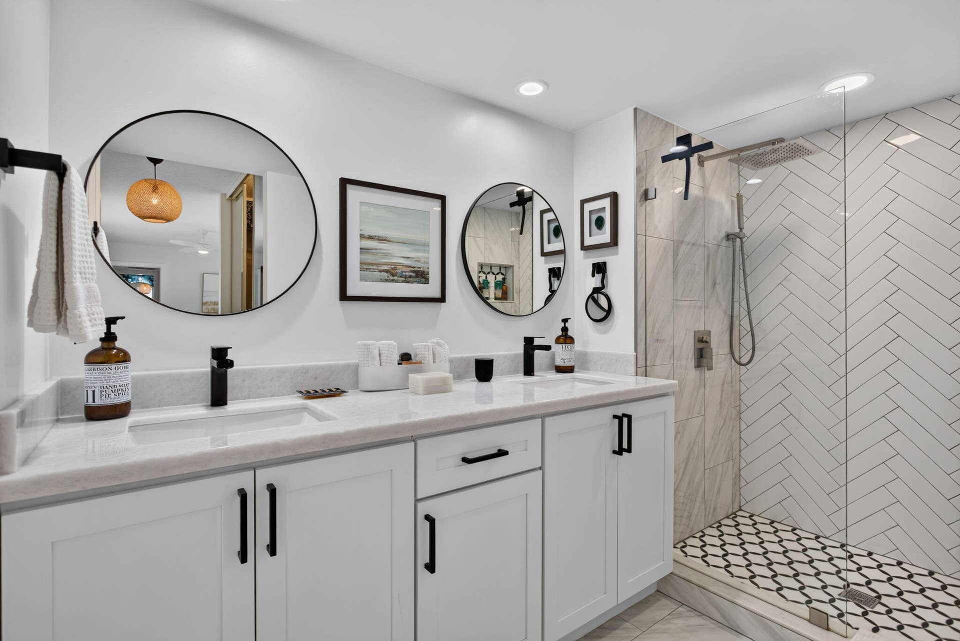 9113 SW 20th Court, #A, Davie, FL 33324 Dual vanity with white cabinetry and black hardware
