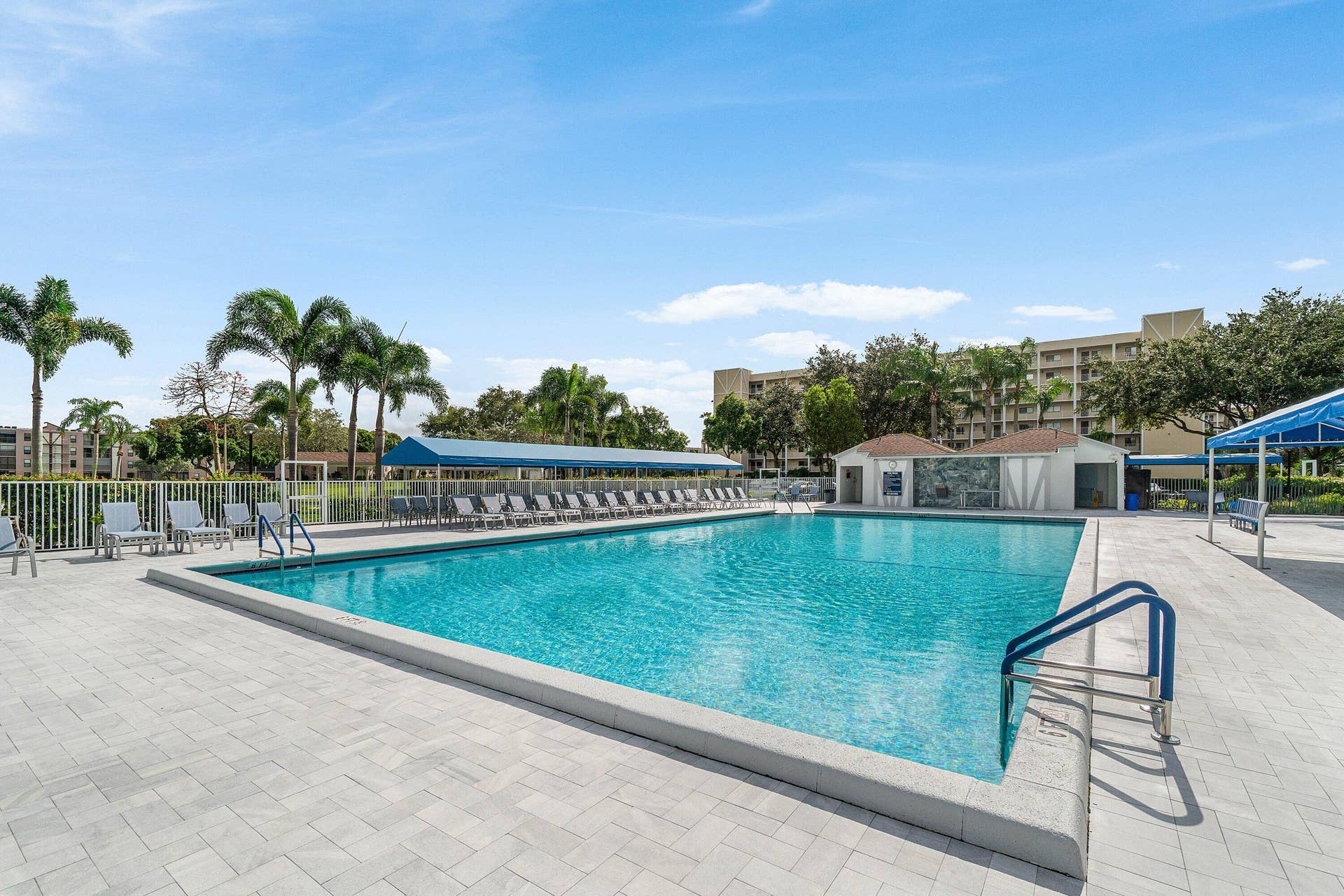 7290 KINGHURST Drive, #106, Delray Beach, FL 33446 POOL STEPS AWAY