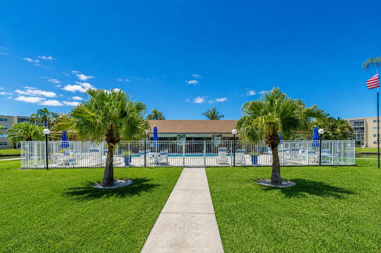 Unit View of the Community pool area steps away from your door