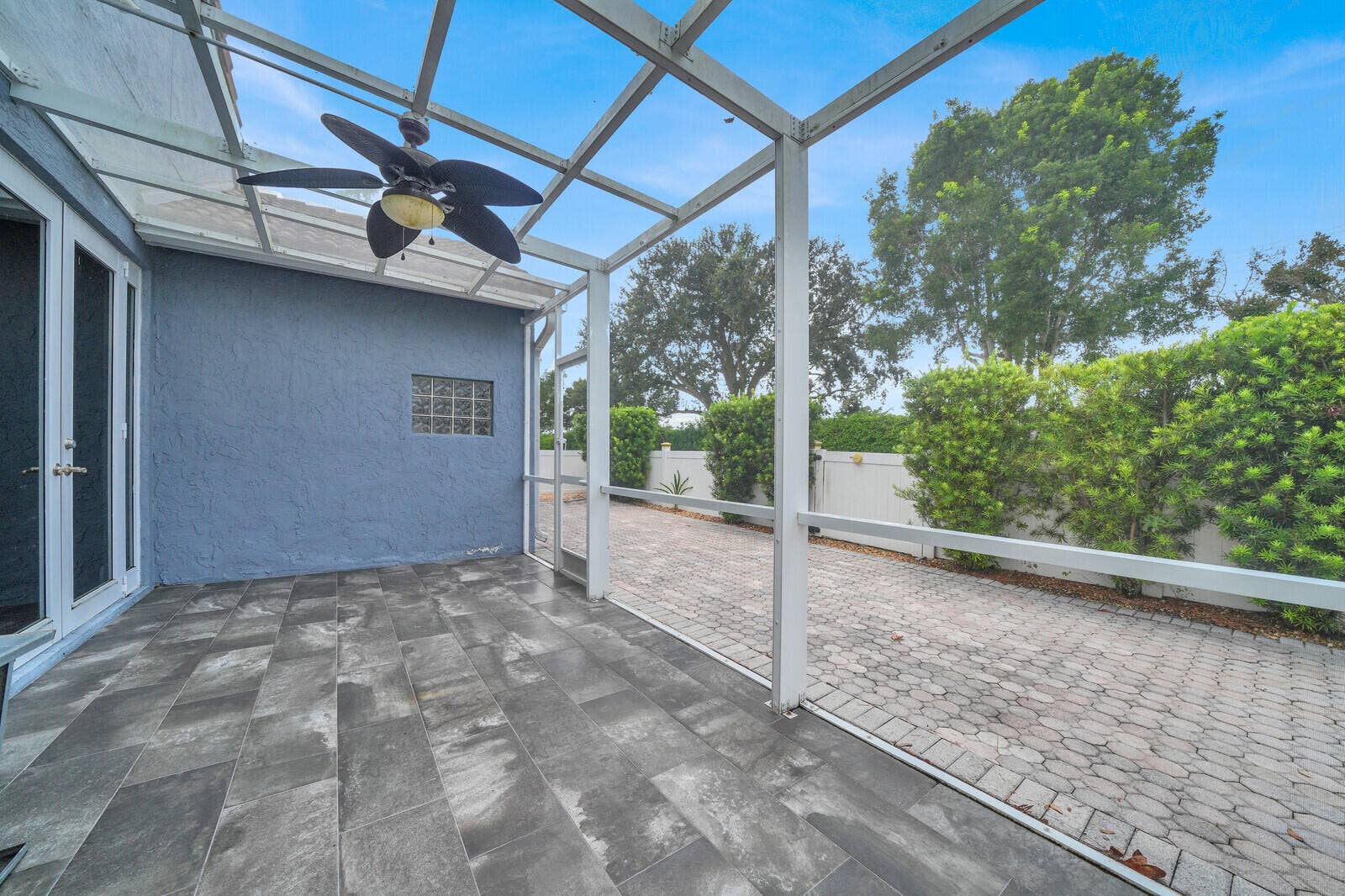 SCREENED IN PATIO OFF PRIMARY BEDROOM