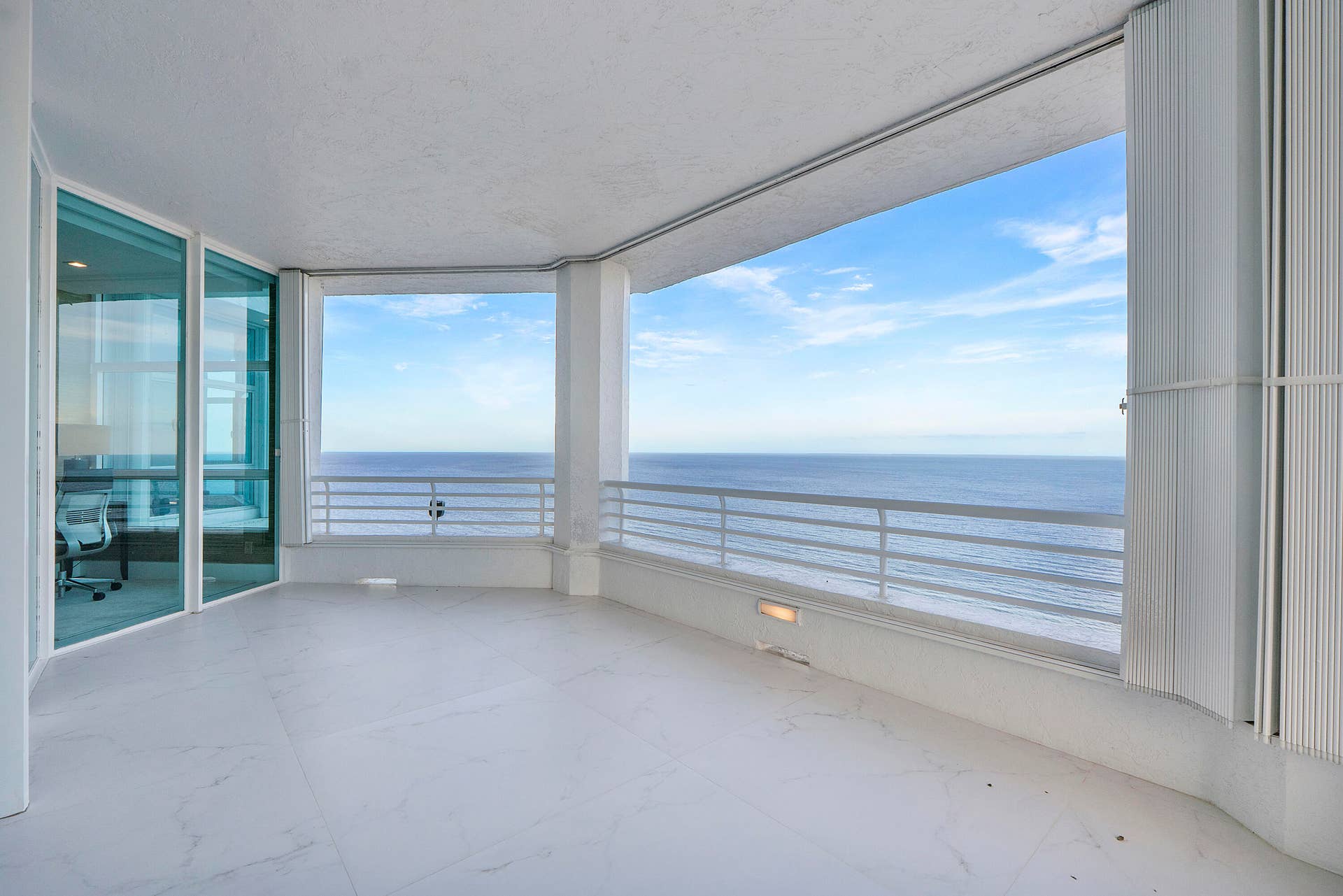 1700 S OCEAN Boulevard, #PH B-D, Lauderdale By The Sea, FL 33062 An impressive 1,600 square feet of imported European porcelain-clad terraces wrap gracefully around the entire penthouse, extending from every floor-to-ceiling window and sliding glass door. These magnificent balconies create a seamless transition between the luxurious interiors and the spectacular outdoors, offering front-row seats to breathtaking sunrises over the Atlantic Ocean and mesmerizing sunsets across the Intracoastal, the Fort Lauderdale skyline, and the Everglades beyond. Designed for effortless entertaining and tranquil relaxation, these expansive terraces are as extraordinary as the residence itself.