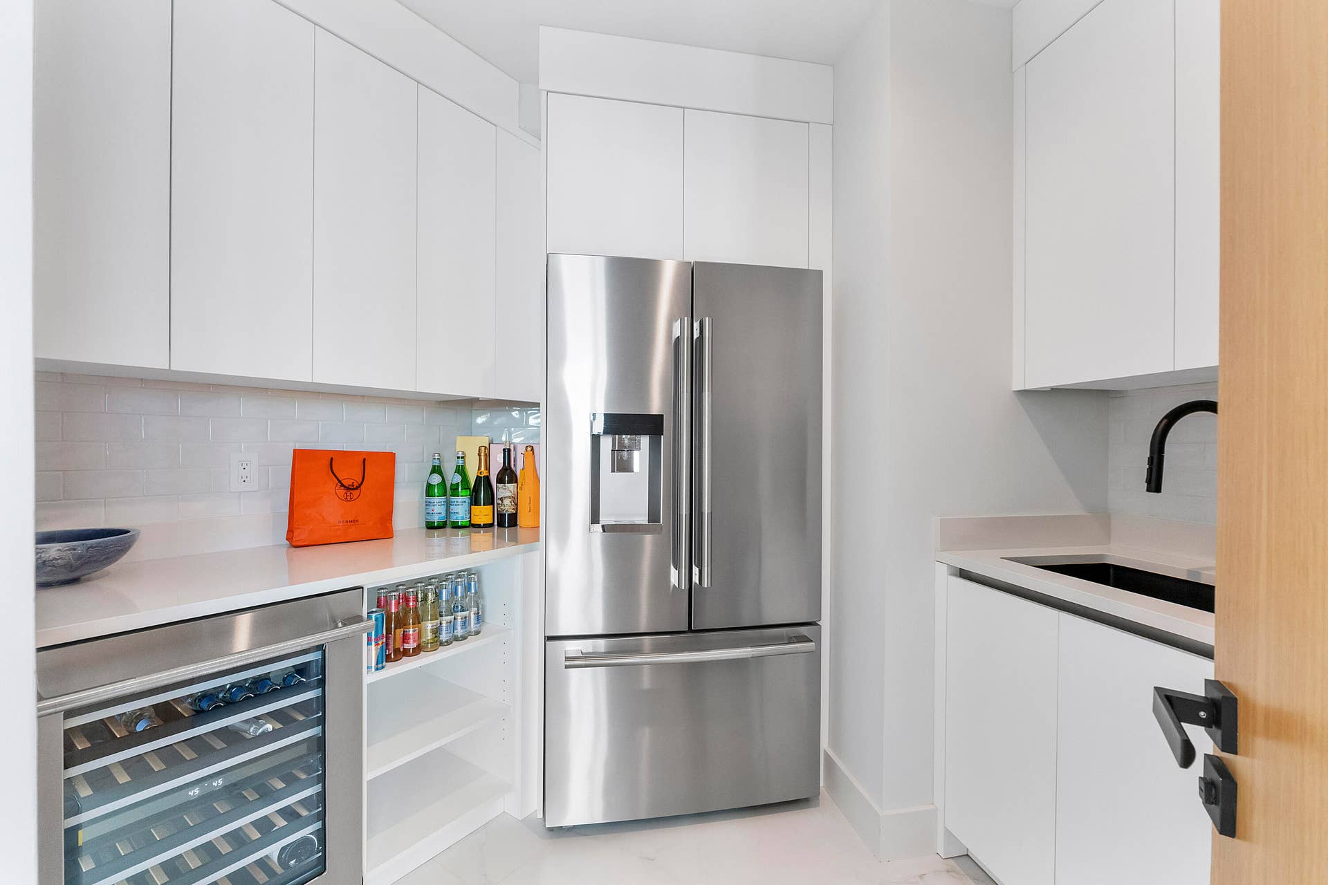 1700 S OCEAN Boulevard, #PH B-D, Lauderdale By The Sea, FL 33062 THE CHAMPAGNE ROOM A private service pantry devoted to the rituals of entertaining, where Champagne chills, crystal awaits and silver trays are prepared out of sight before being carried into the penthouses spectacular entertaining spaces.