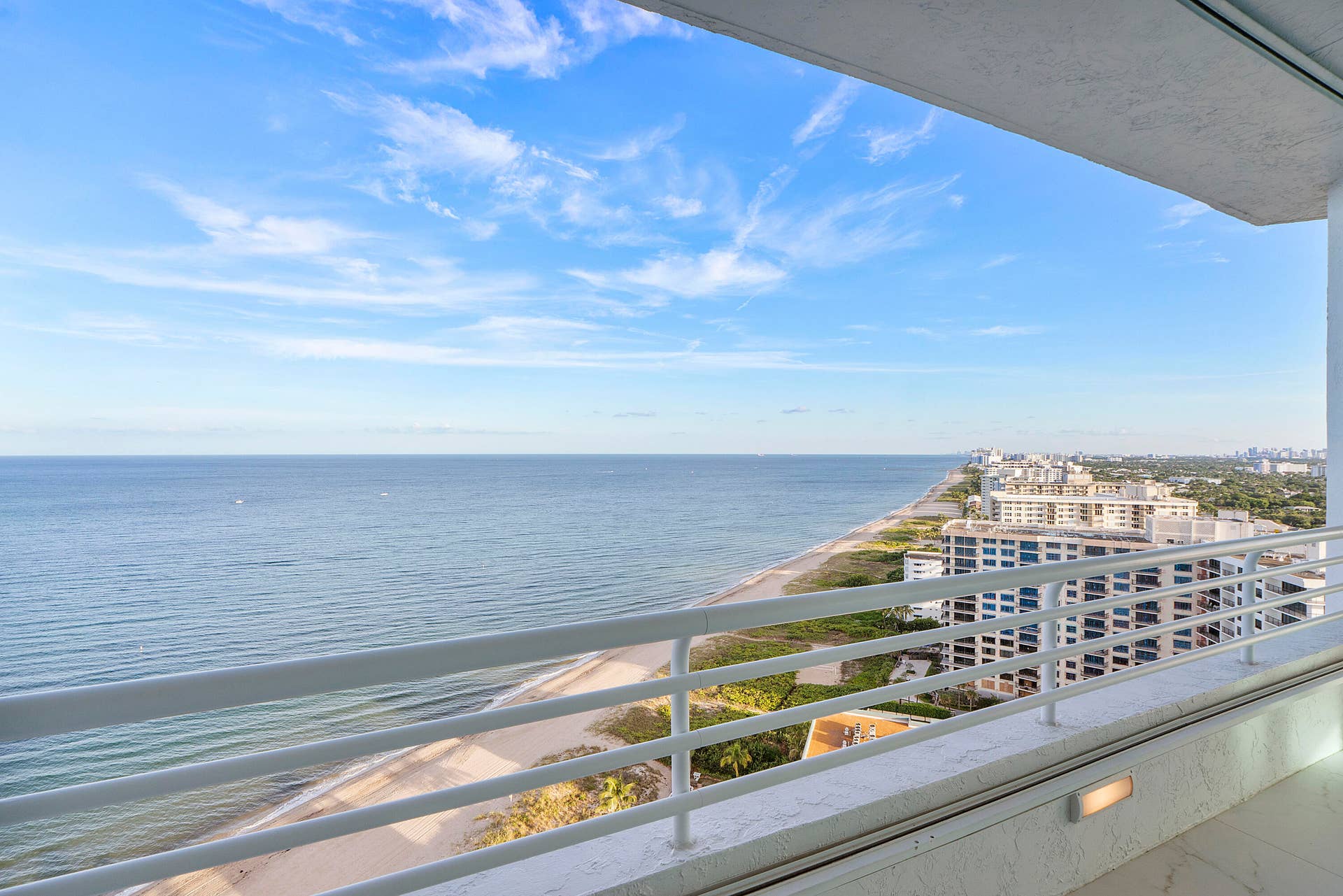 1700 S OCEAN Boulevard, #PH B-D, Lauderdale By The Sea, FL 33062 An extraordinary 1,600 square feet of wide, fully covered balconies envelop the penthouse, beautifully finished in European porcelain and designed to feel like gracious outdoor rooms in the sky. With exceptional space for fine dining on the terrace, imagine an elegant holiday table surrounded by family and friends, leisurely alfresco dinners overlooking the coastline, or intimate evenings for two with sun loungers, luxurious patio furnishings and a romantic bottle of wine as the sky transforms with the setting sun. Sheltered yet completely open to the magnificent ocean, Intracoastal and skyline views, these expansive terraces offer a rare outdoor lifestyle that can be enjoyed from sunrise to sunset.