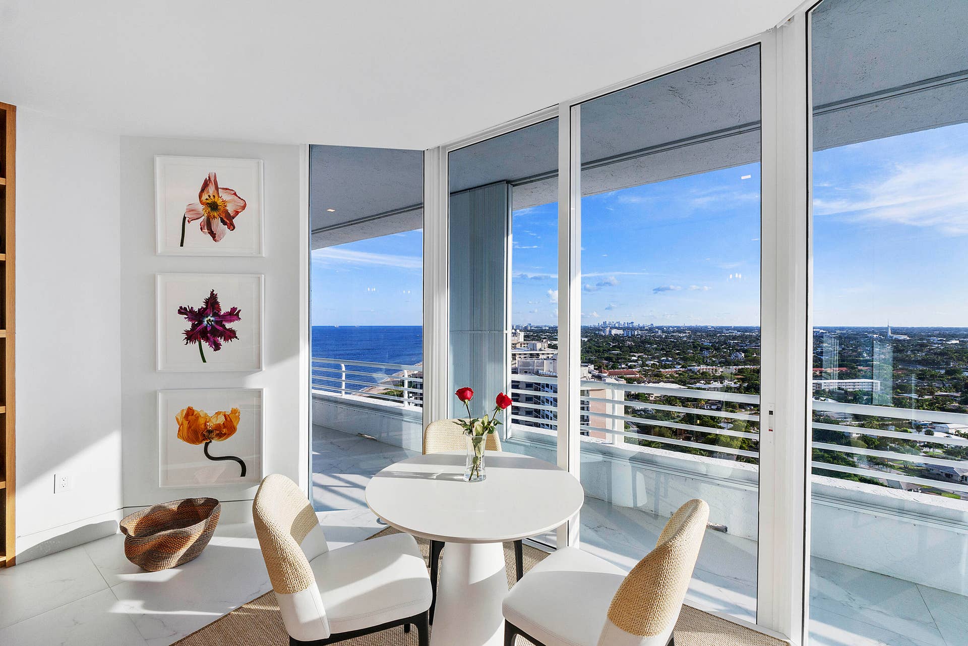 1700 S OCEAN Boulevard, #PH B-D, Lauderdale By The Sea, FL 33062 Inspired by the timeless charm of a French caf, this intimate dining retreat offers a peaceful escape within the heart of the home. Surrounded by panoramic views of the Atlantic Ocean and the sparkling Fort Lauderdale skyline, it is the perfect place to enjoy a leisurely breakfast, a light lunch, or a private wine tasting as the city transforms from day to evening sunsets.