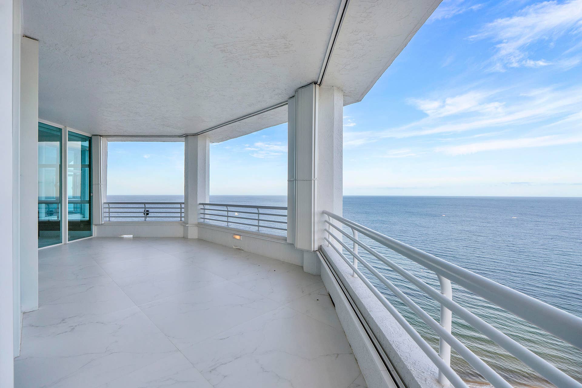 1700 S OCEAN Boulevard, #PH B-D, Lauderdale By The Sea, FL 33062 The expansive wraparound terraces are designed for exceptional outdoor living and entertaining. With over 1,600 square feet of beautifully finished European porcelain balconies, there is ample space to host a grand Thanksgiving dinner, an elegant sunset cocktail reception, or a lavish celebration with family and friends. Whether accommodating an intimate gathering or a large party, these remarkable terraces provide endless possibilities, all while surrounded by breathtaking panoramic views of the Atlantic Ocean, the Intracoastal Waterway, the Fort Lauderdale skyline, and the Everglades. This extraordinary outdoor living space is truly an extension of the home's luxurious interior, offering an unforgettable setting for every occasion.