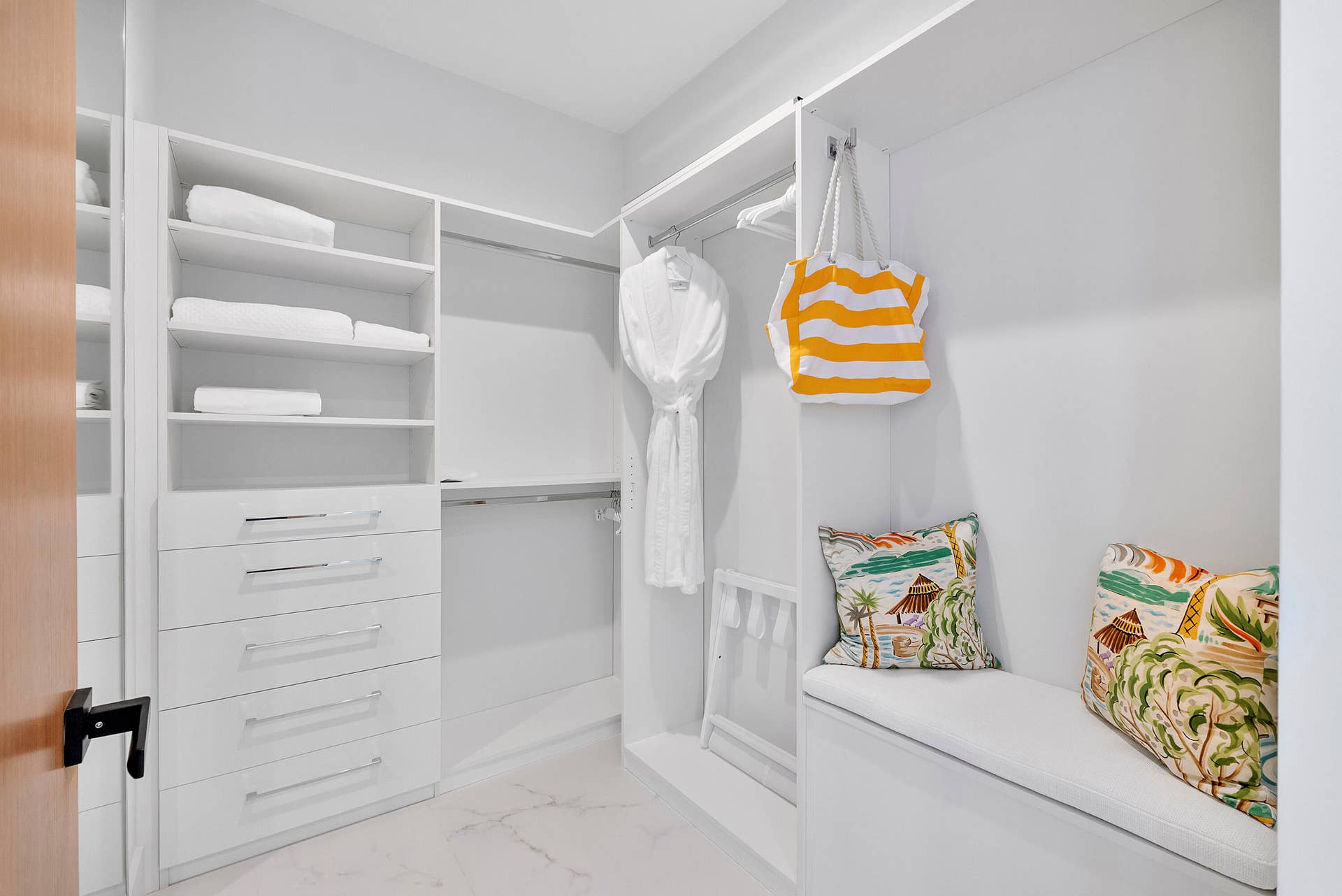 1700 S OCEAN Boulevard, #PH B-D, Lauderdale By The Sea, FL 33062 Completing the suite is its private custom-fitted dressing room, beautifully organized with extensive built-in shelving, drawers, hanging space and a charming integrated benchgiving overnight guests the luxury of unpacking completely and settling into their own private quarters as though arriving at an intimate five-star residence.